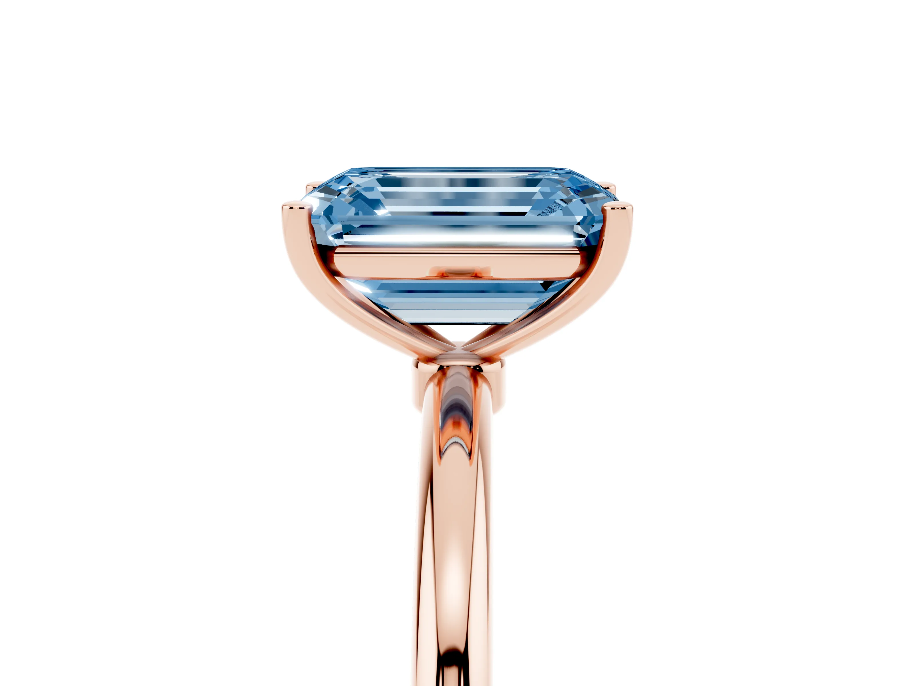 Fancy Blue Emerald Cut Diamond Solitaire Engagement Ring Set in Rose gold with Thin Band and Prong Setting