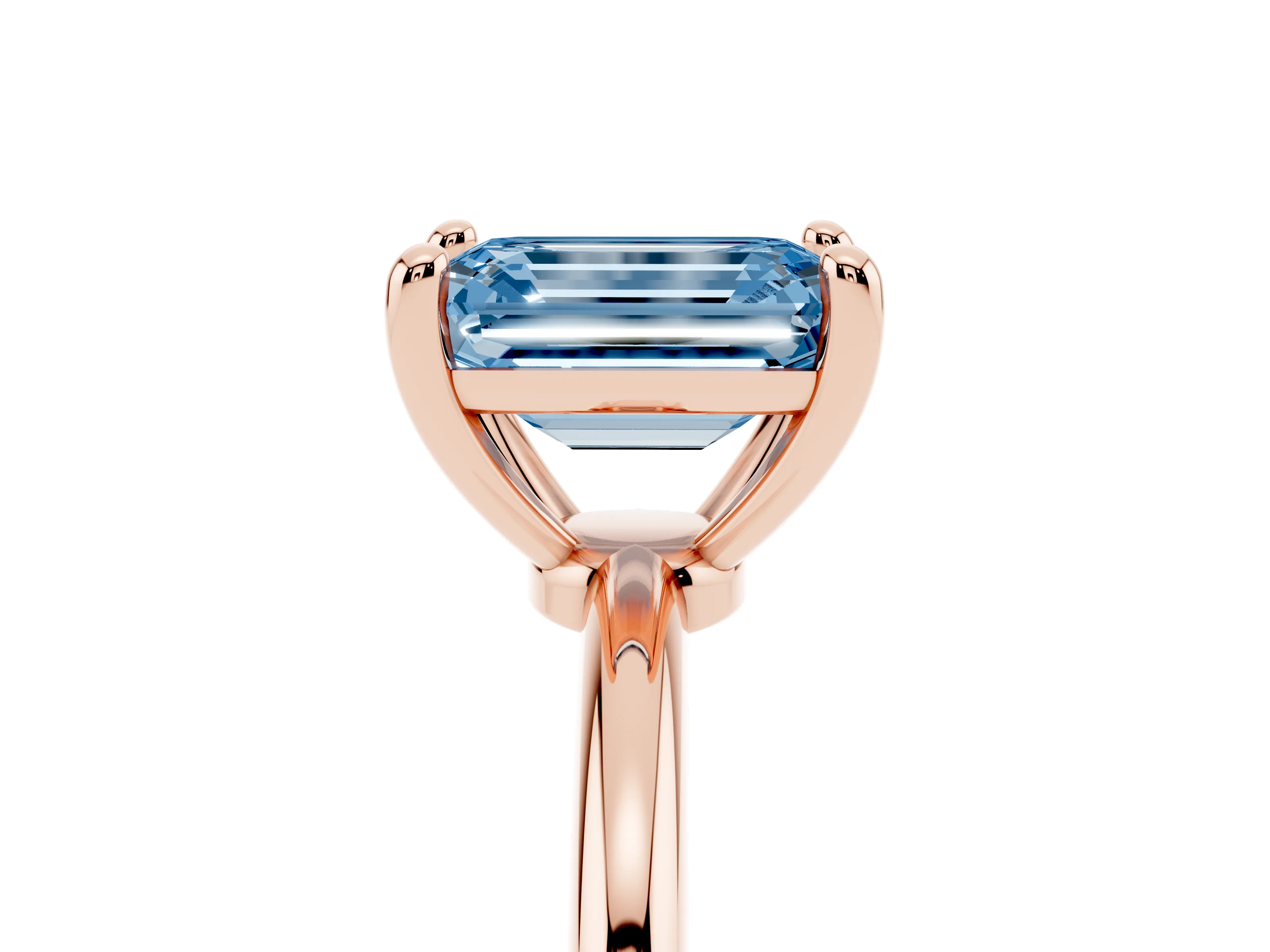 Fancy Blue Emerald Cut Diamond Solitaire Ring Set in Rose gold with Secure Prong Setting on a Classic Band