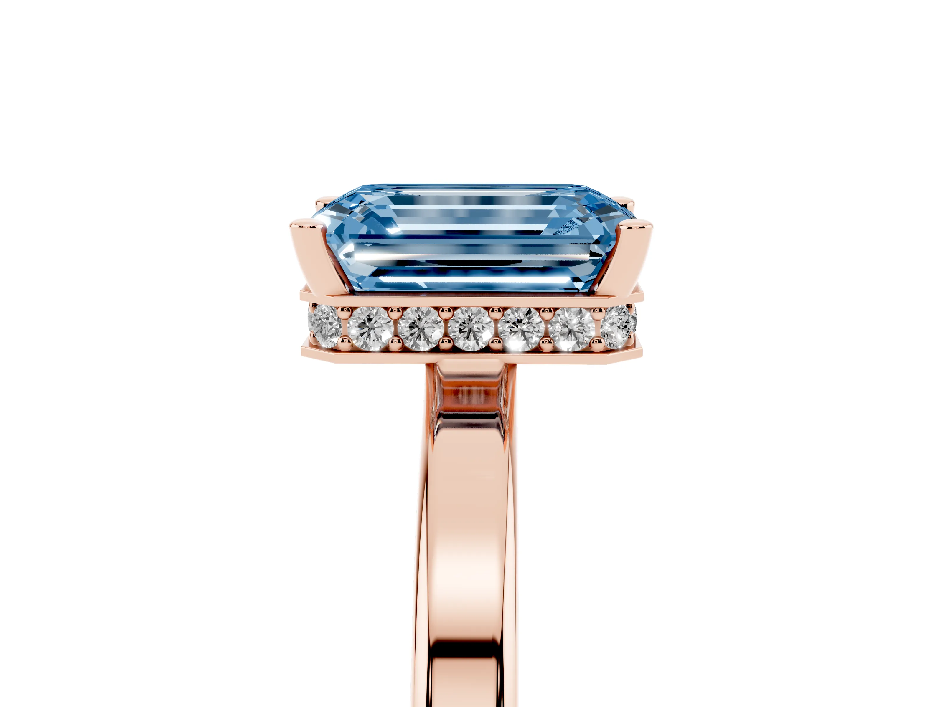 Fancy Blue Emerald Cut Diamond Solitaire Engagement Ring Set in Rose gold with Prong Setting on a Plain Band
