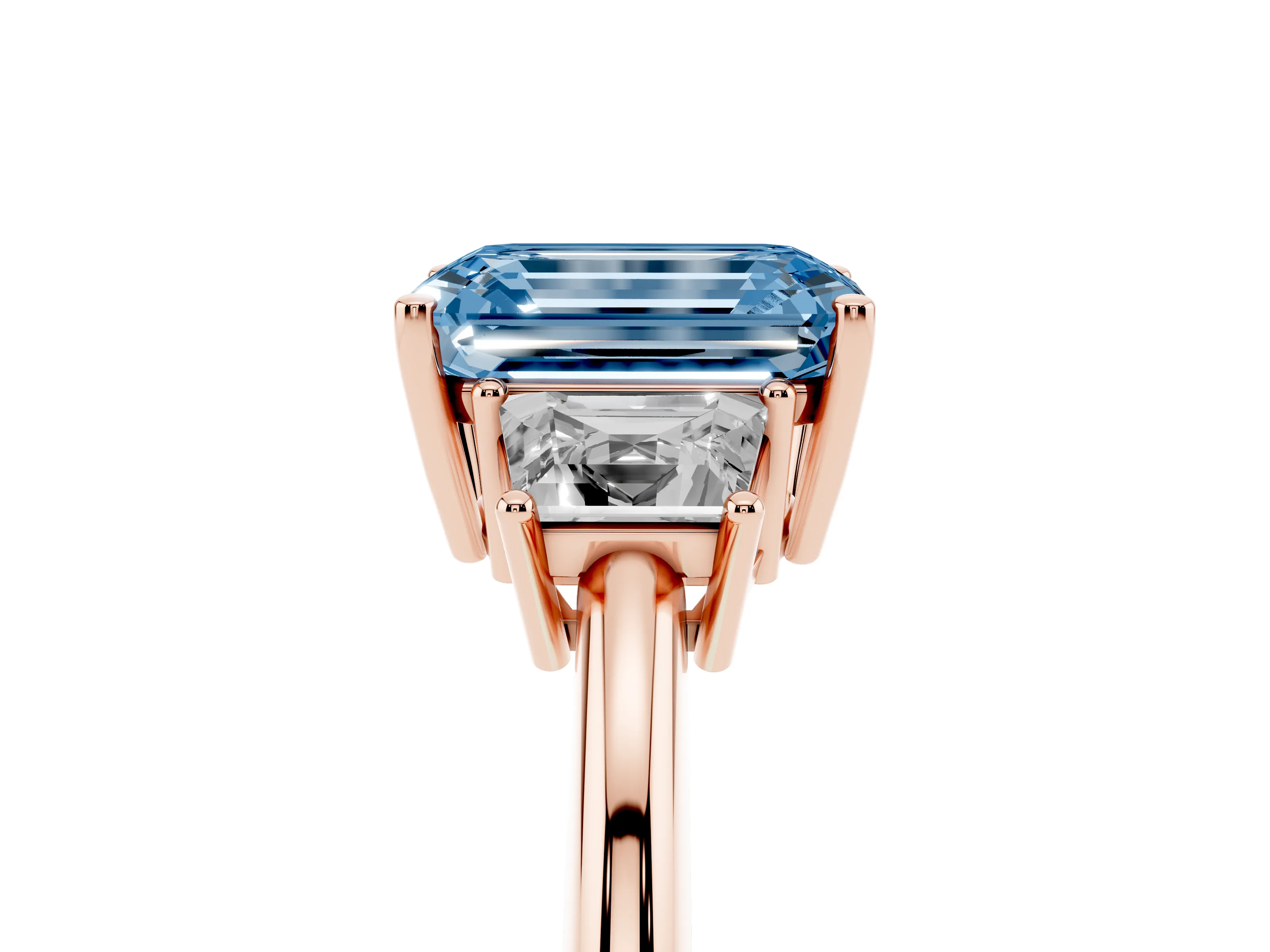 Fancy Blue Emerald Cut Diamond Three-Stone Ring Set in Rose gold with Trapezoid Side Stones and Prong Setting