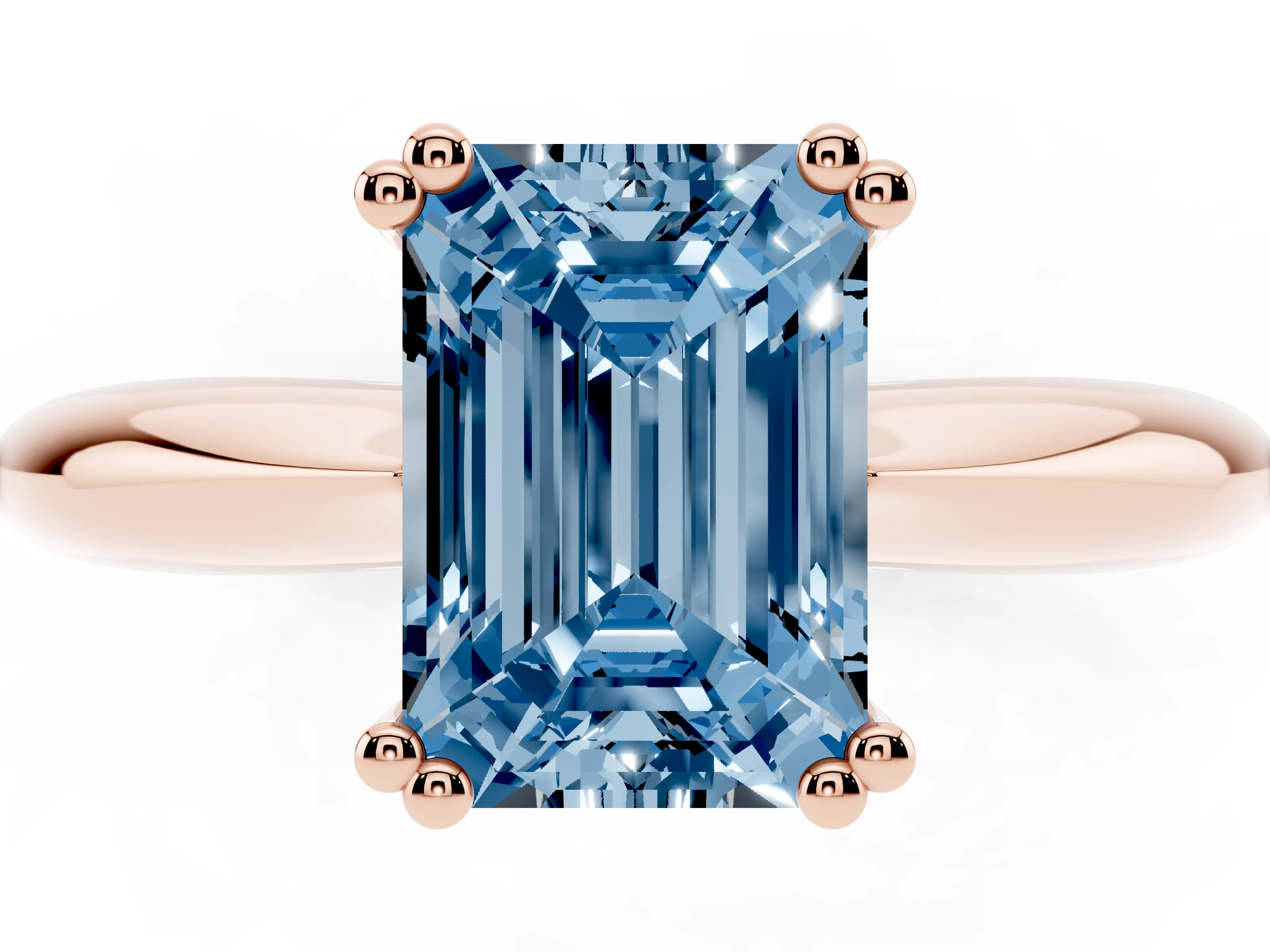 Fancy Blue Emerald Cut Diamond Solitaire Engagement Ring Set in Rose gold with Tapered Band and Prong Setting