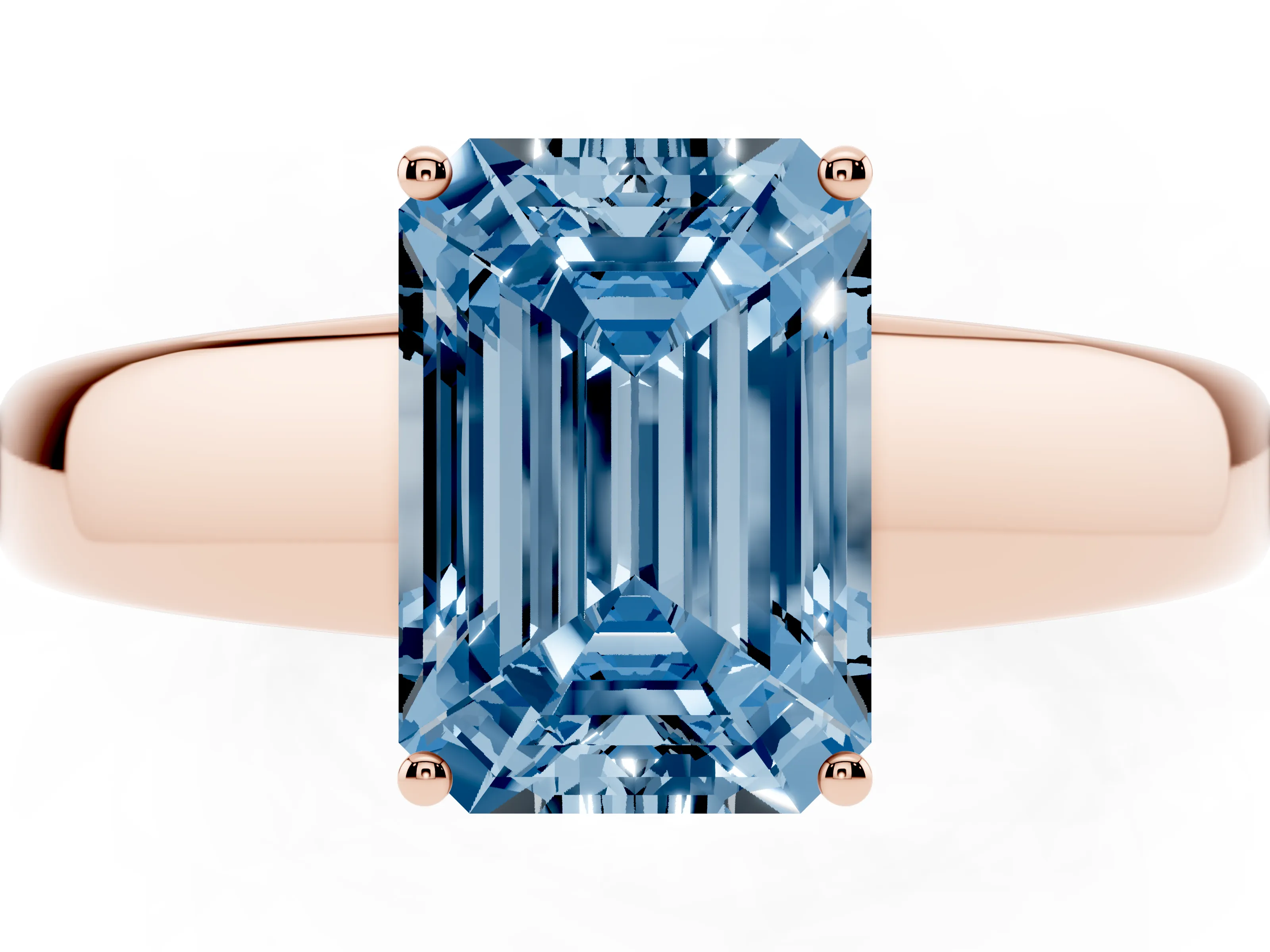 Fancy Blue Emerald Cut Diamond Solitaire Ring Set in Rose gold with Tapered Band and Prong Setting