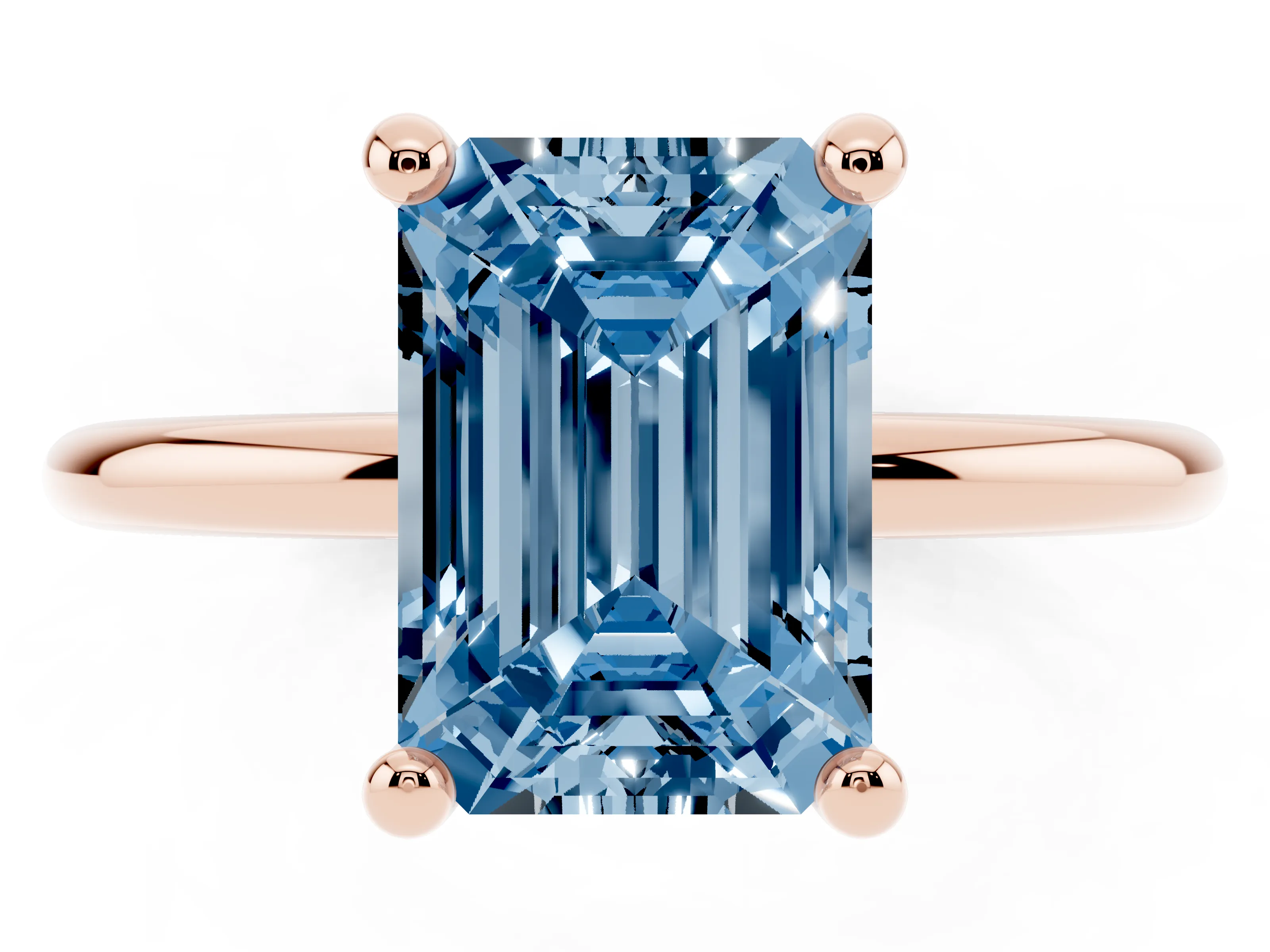 Fancy Blue Emerald Cut Diamond Solitaire Ring Set in Rose gold with Secure Prong Setting on a Classic Band