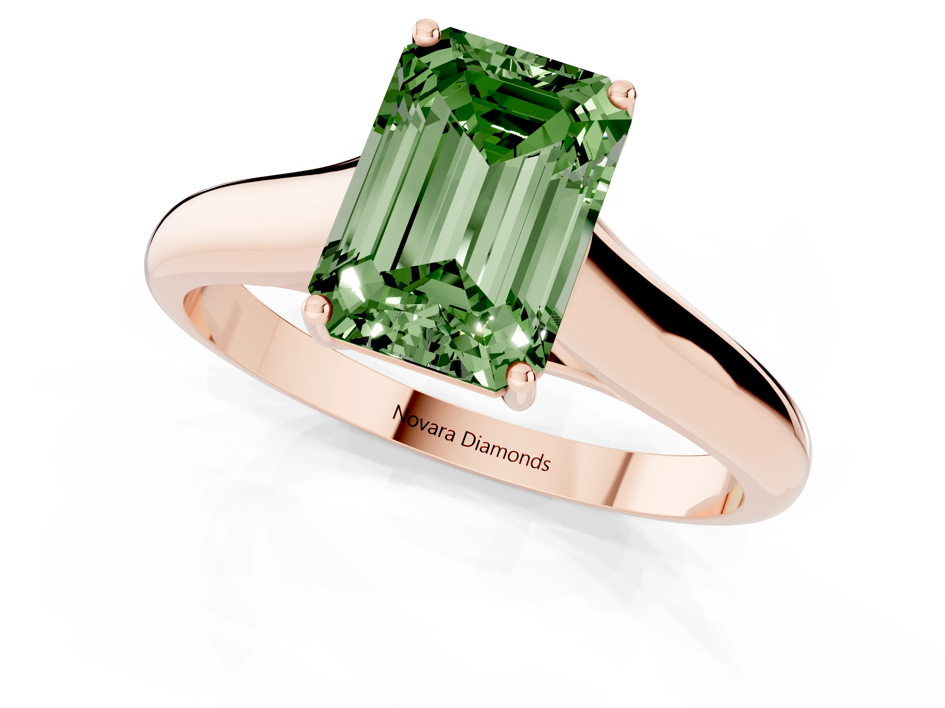Fancy Green Emerald Cut Diamond Solitaire Engagement Ring Set in Rose gold with Subtly Tapered Band and Prong Setting