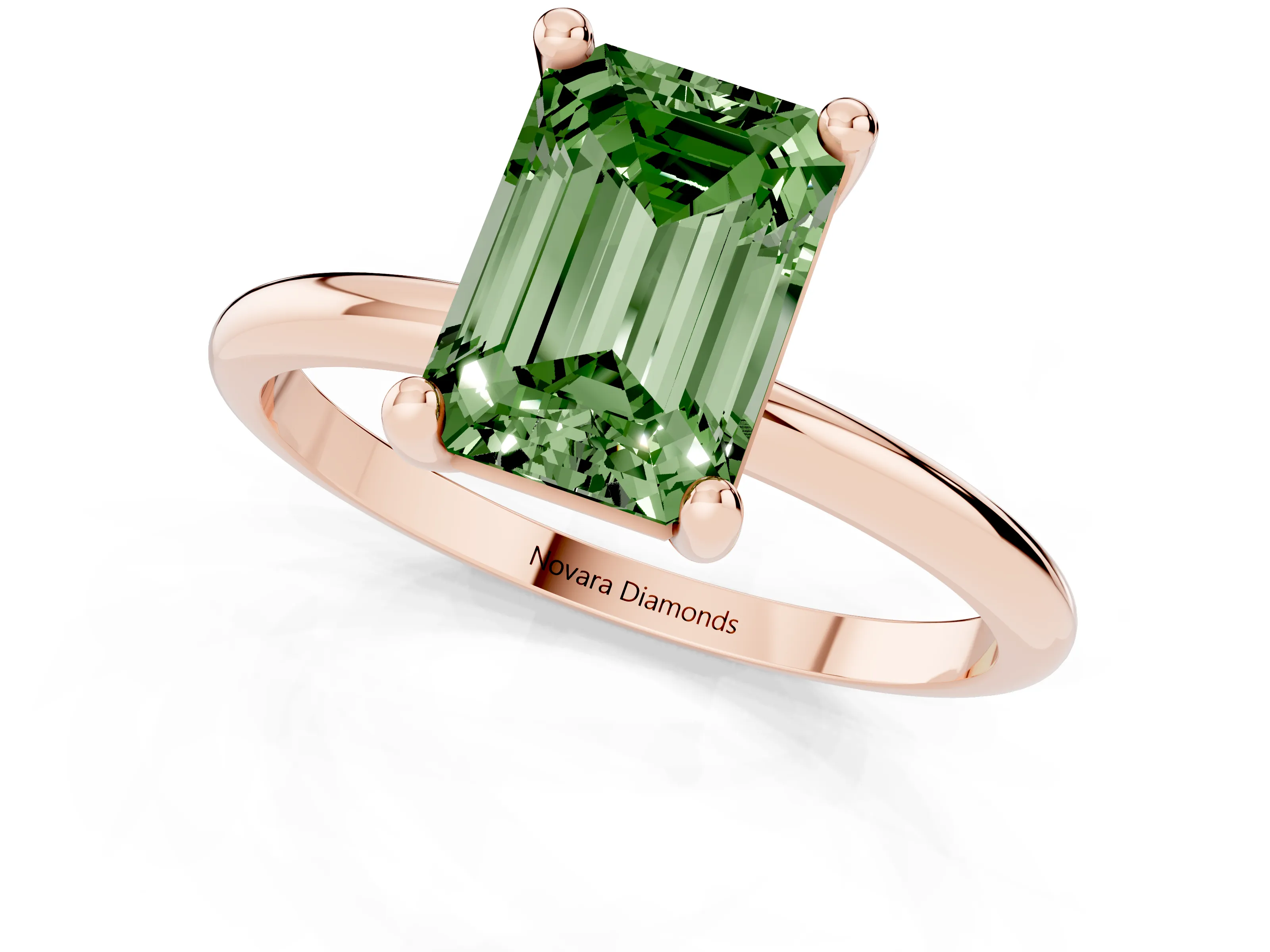 Fancy Green Emerald Cut Diamond Solitaire Ring Set in Rose gold with Secure Prong Setting on a Classic Band
