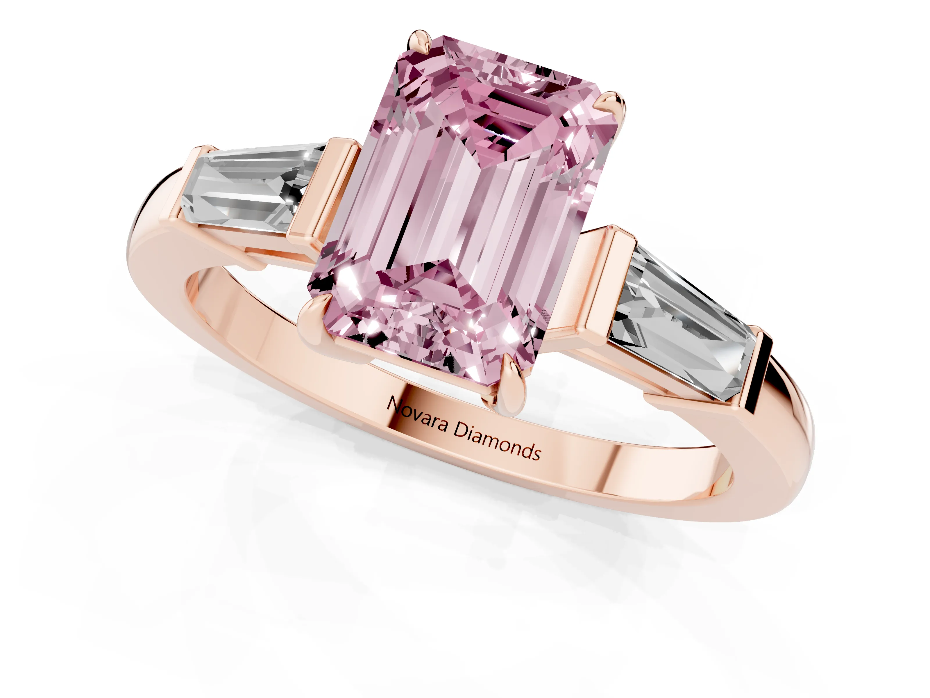 Fancy Pink Emerald Cut Diamond Three-Stone Ring Set in Rose gold with Tapered Baguette Side Stones and Prong Setting