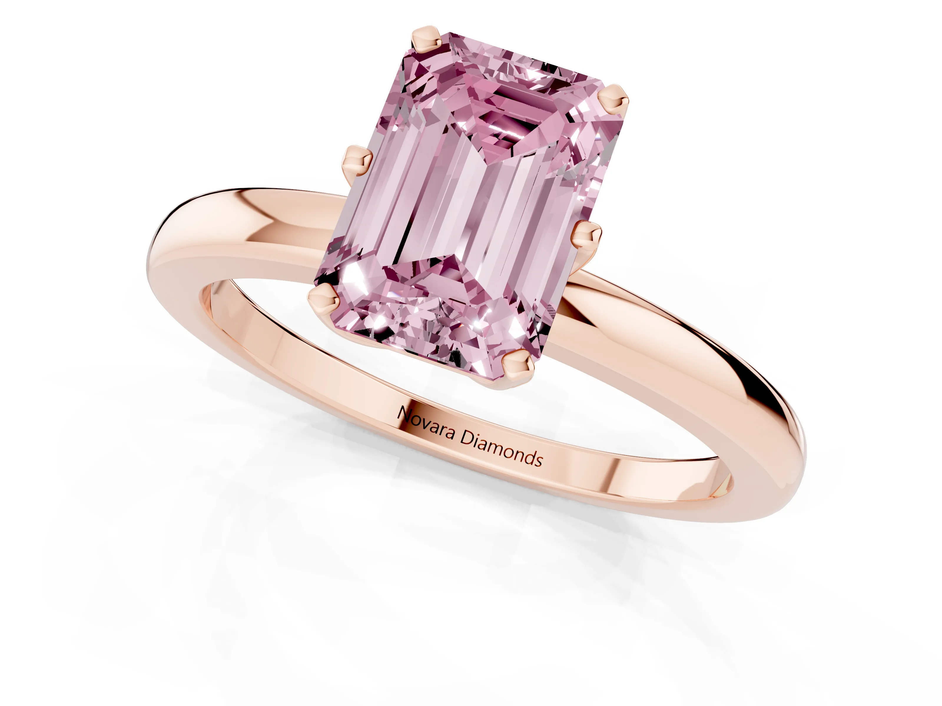 Fancy Pink Emerald Cut Diamond Solitaire Ring Set in Rose gold with Raised Prong Setting on a Classic Band