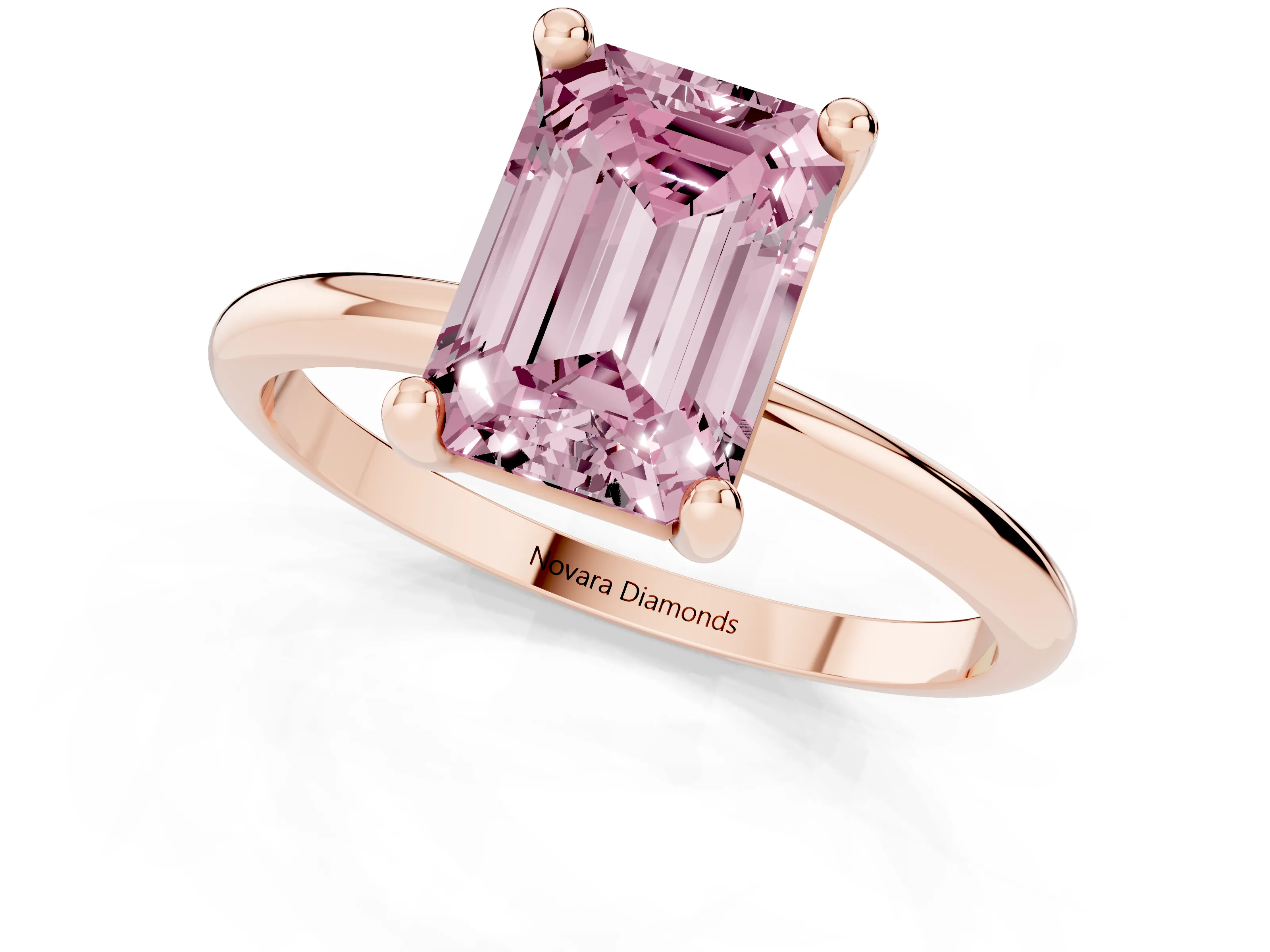 Fancy Pink Emerald Cut Diamond Solitaire Ring Set in Rose gold with Secure Prong Setting on a Classic Band