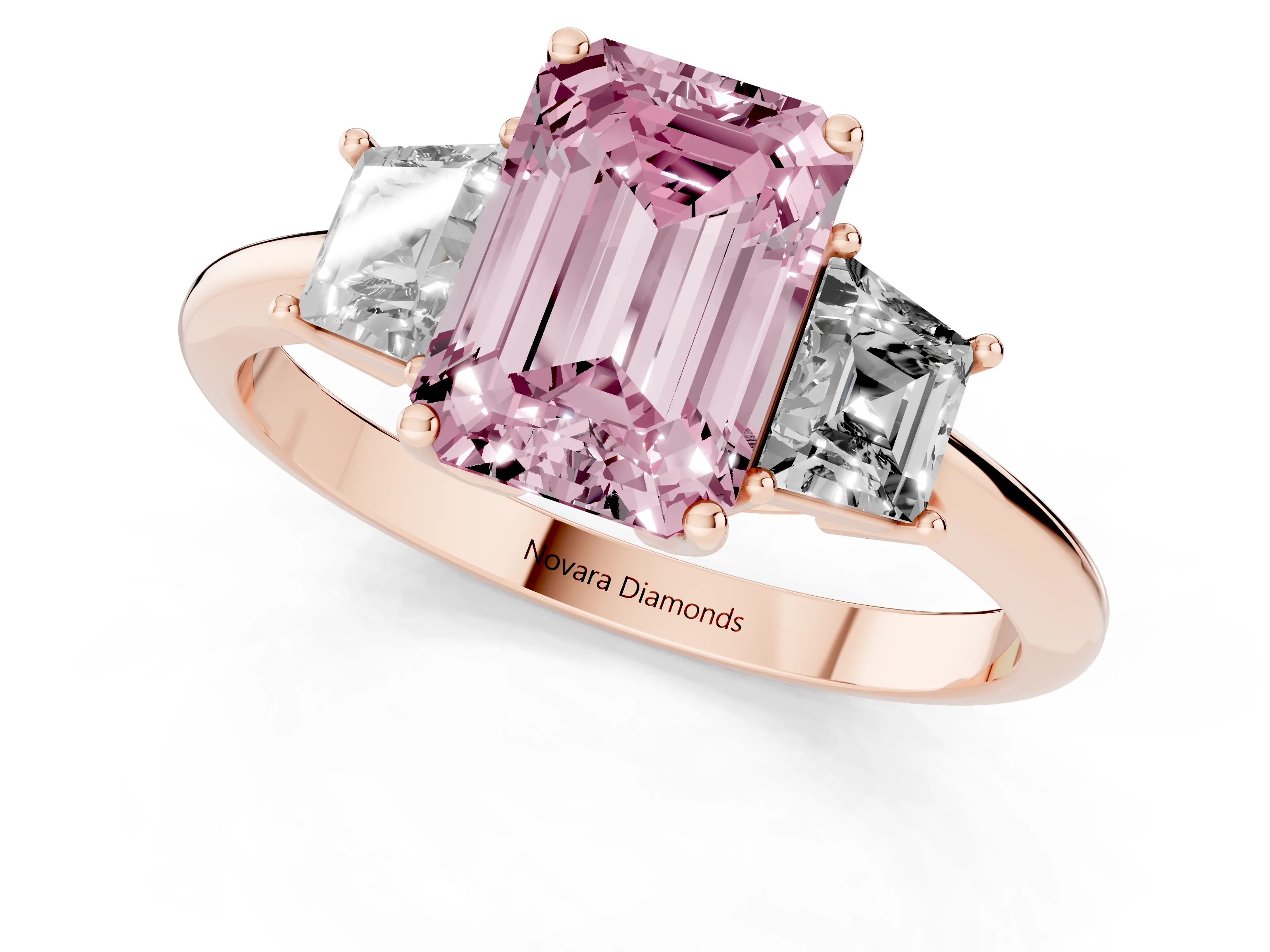 Fancy Pink Emerald Cut Diamond Three-Stone Ring Set in Rose gold with Trapezoid Side Stones and Prong Setting