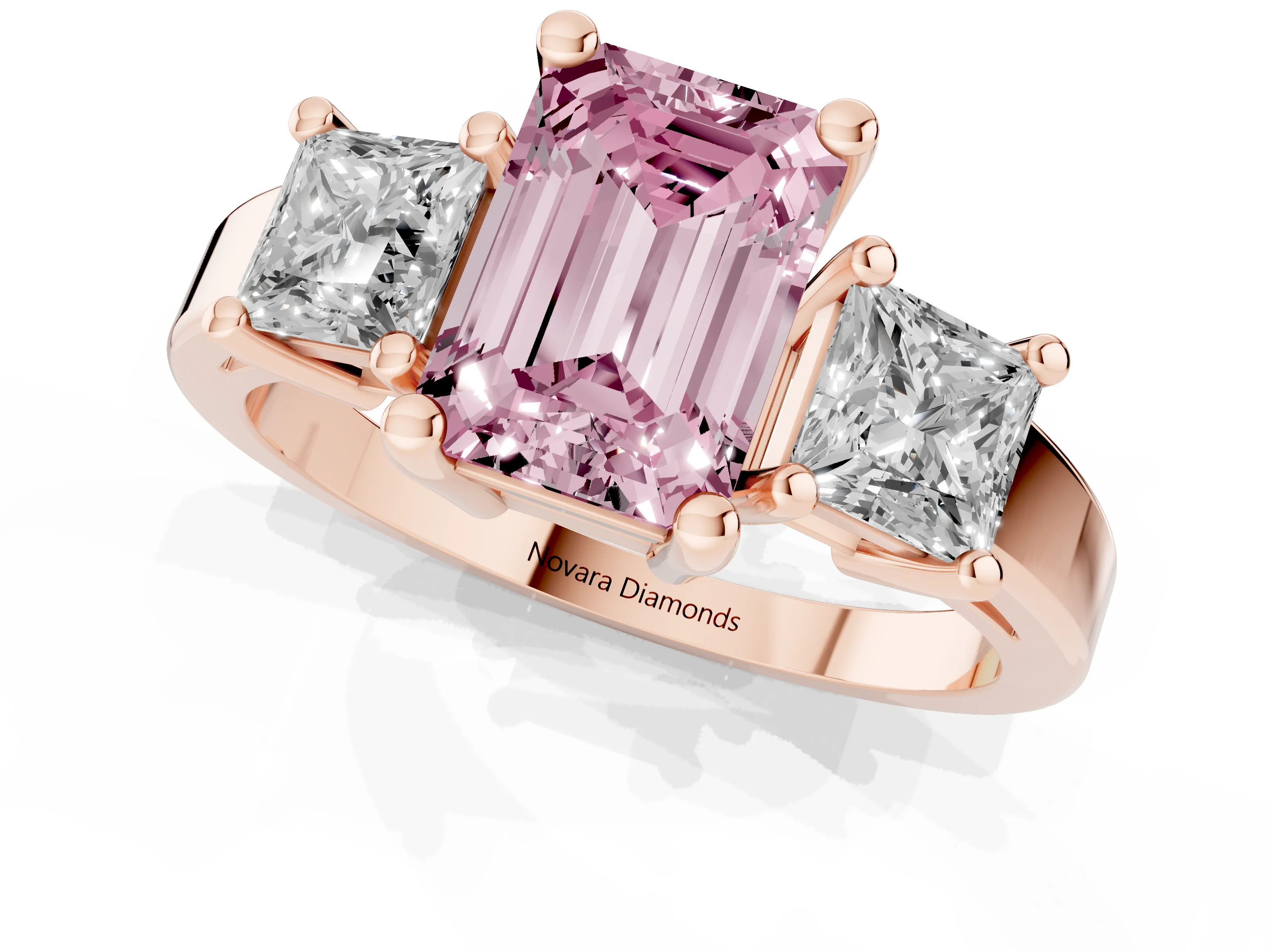 Fancy Pink Three-Stone Emerald Cut Diamond Solitaire Ring Set in Rose gold with Prong Setting