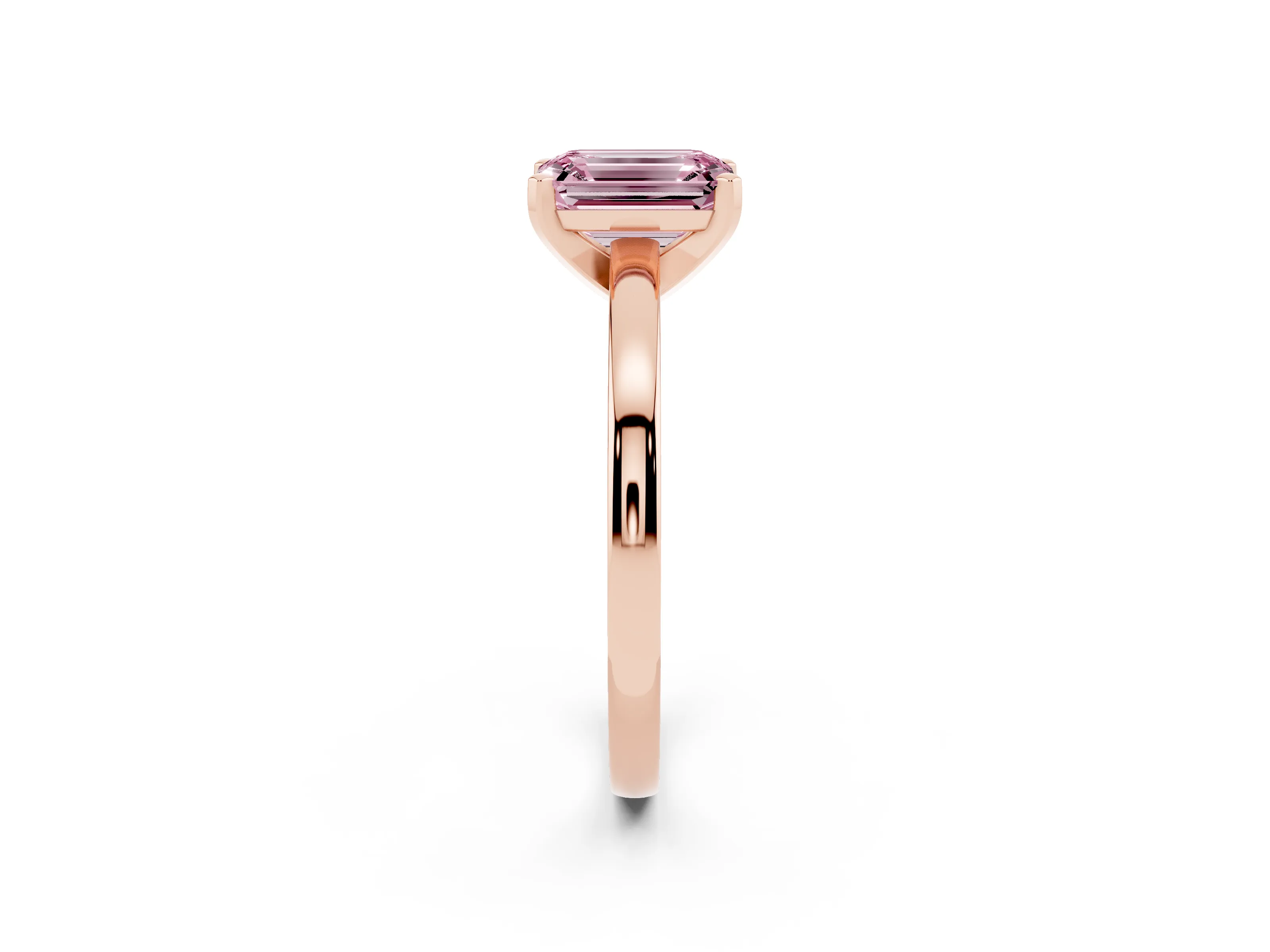 Fancy Pink Emerald Cut Diamond Solitaire Engagement Ring Set in Rose gold with Prong Setting on a Classic Band
