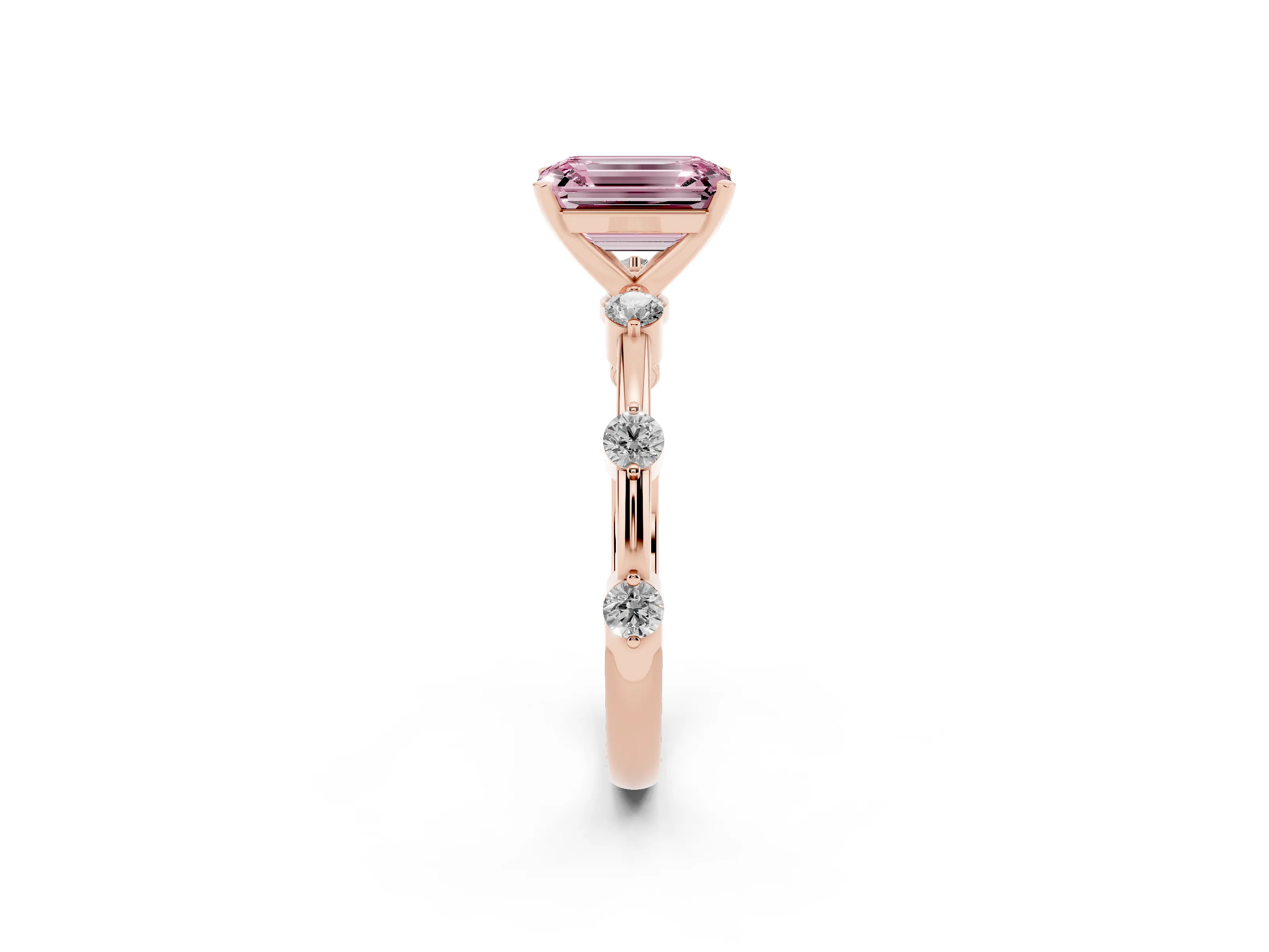 Fancy Pink Emerald Cut Diamond Solitaire Ring Set in Rose gold with Bezel Set Side Stones and Prong Setting