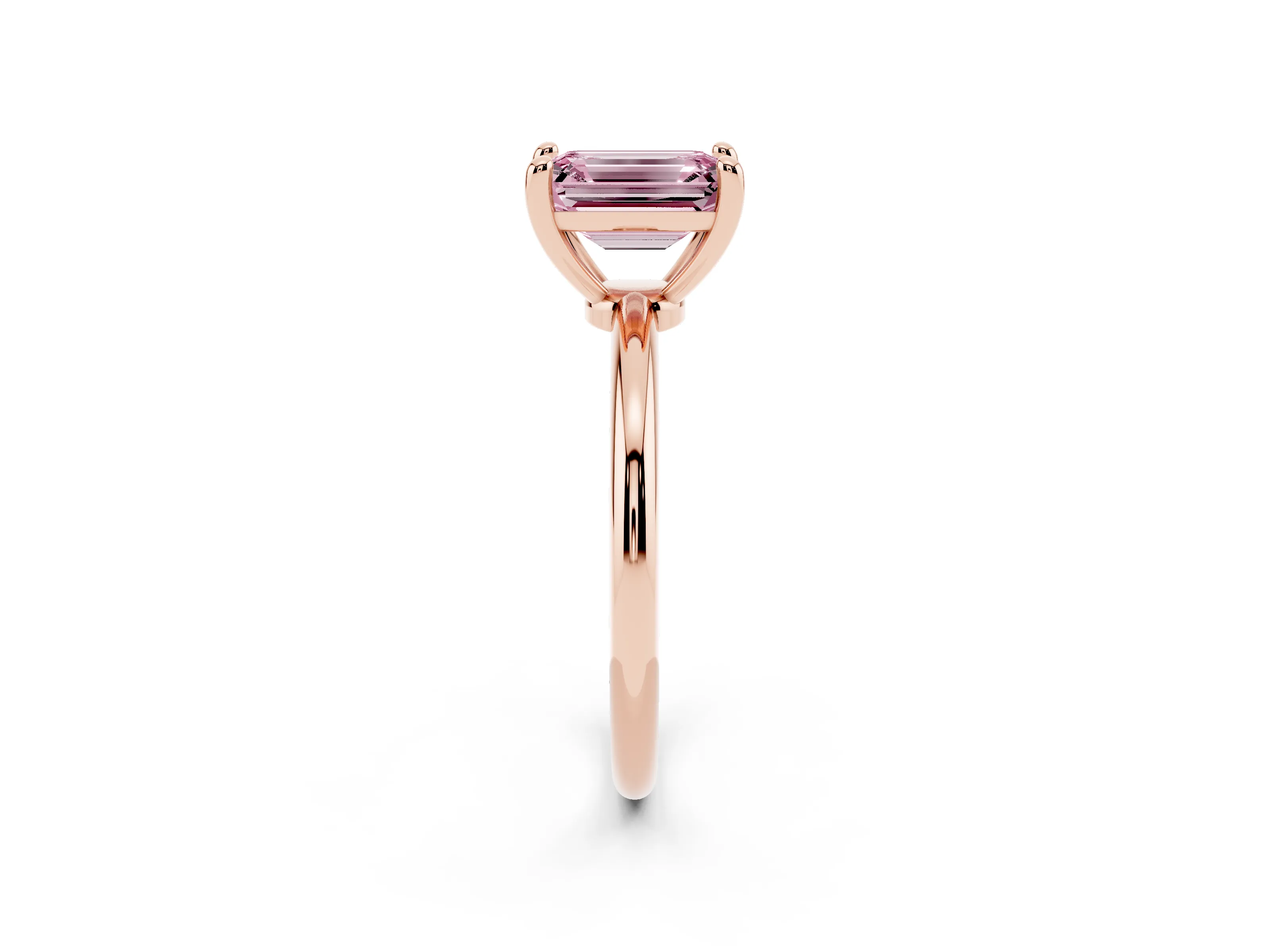 Fancy Pink Emerald Cut Diamond Solitaire Ring Set in Rose gold with Secure Prong Setting on a Classic Band