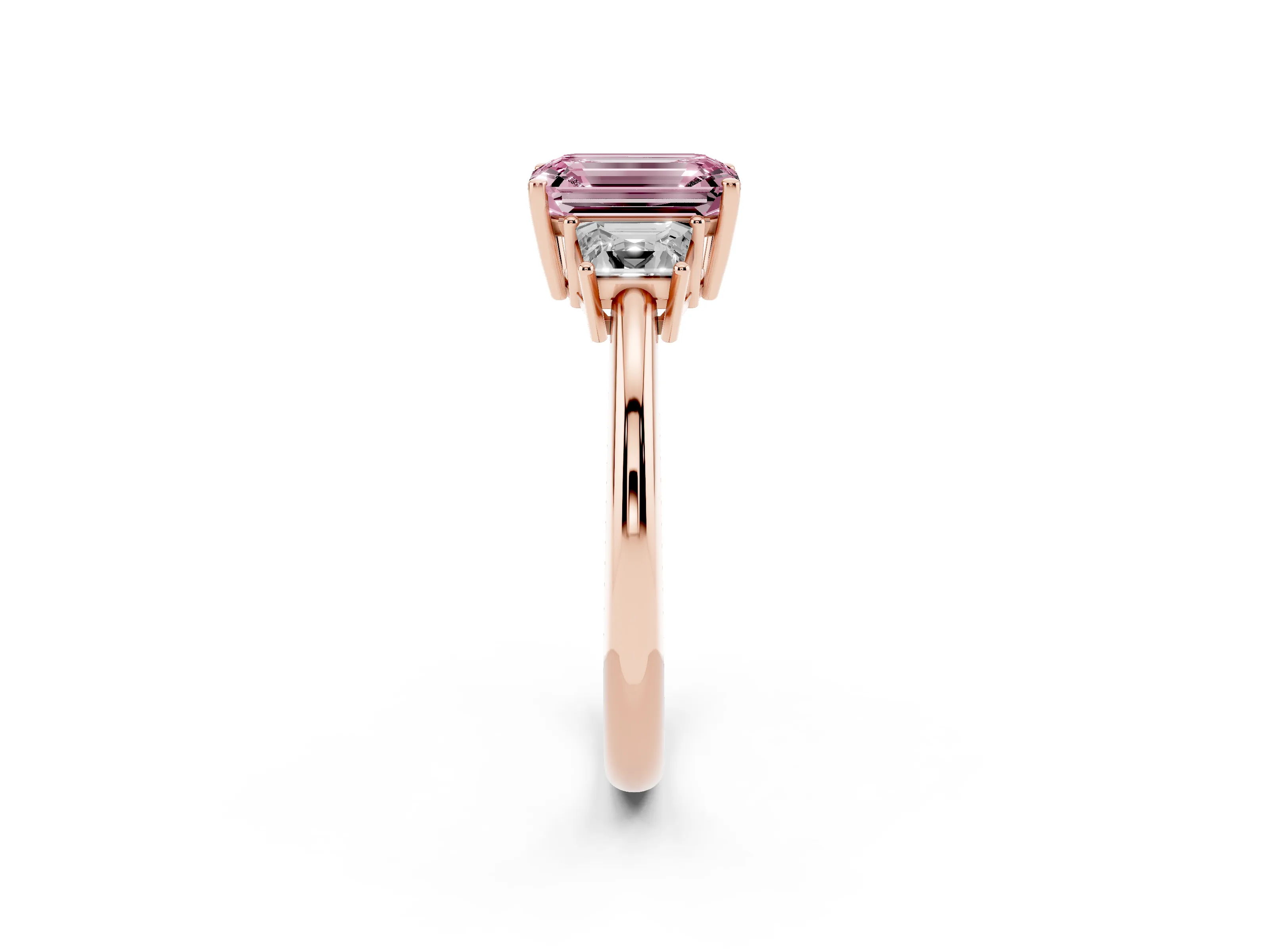 Fancy Pink Emerald Cut Diamond Three-Stone Ring Set in Rose gold with Trapezoid Side Stones and Prong Setting