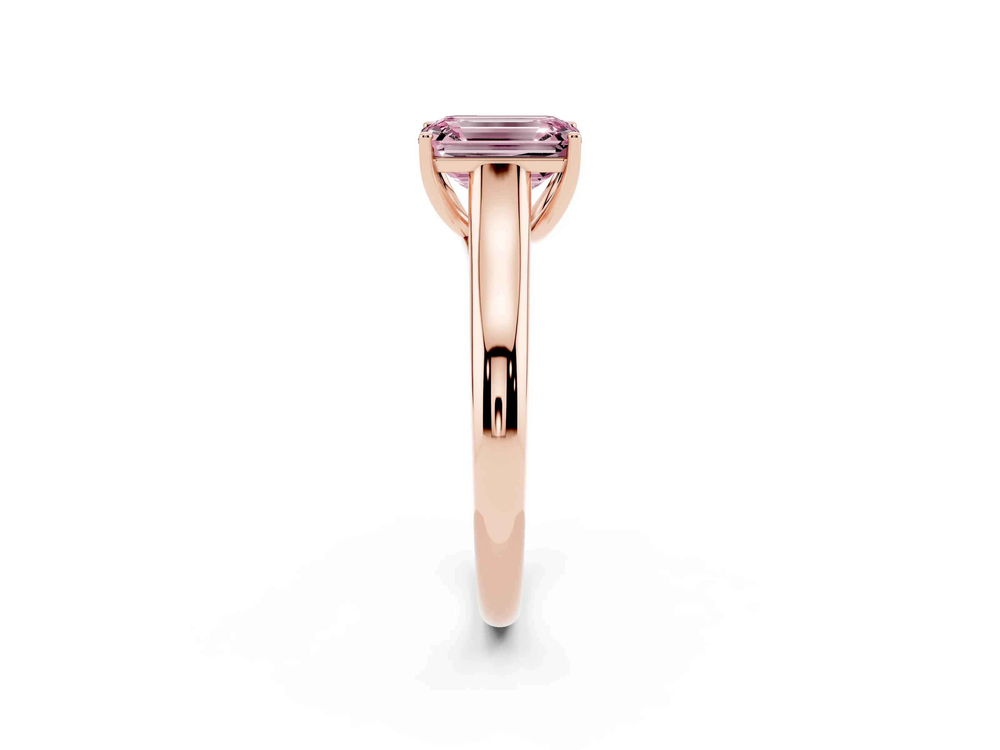 Fancy Pink Emerald Cut Diamond Solitaire Engagement Ring Set in Rose gold with Subtly Tapered Band and Prong Setting