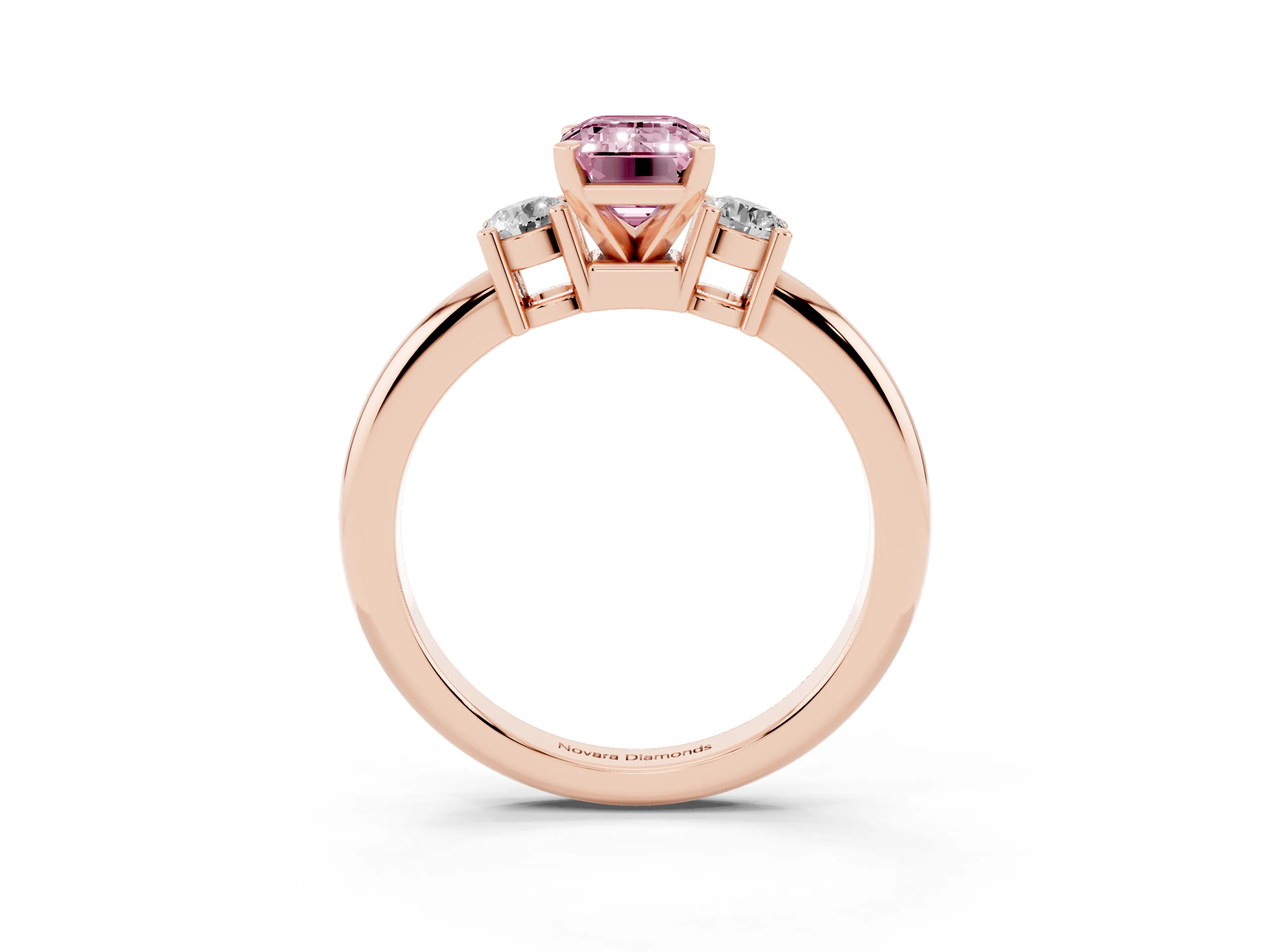 Fancy Pink Three-Stone Emerald Cut Diamond Ring Set in Rose gold with Prong Setting and Plain Band