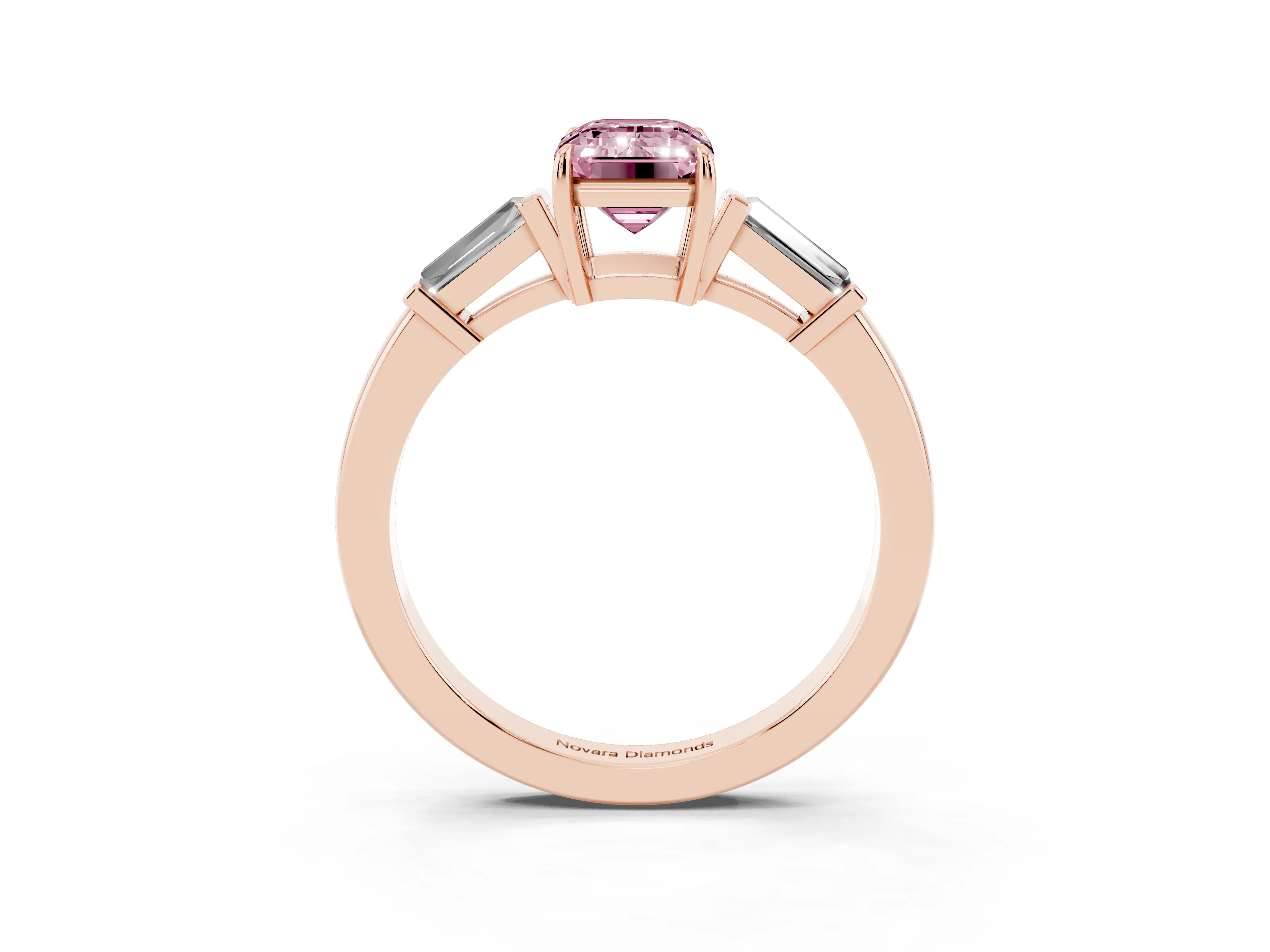 Fancy Pink Emerald Cut Diamond Three-Stone Ring Set in Rose gold with Tapered Baguette Side Stones and Prong Setting