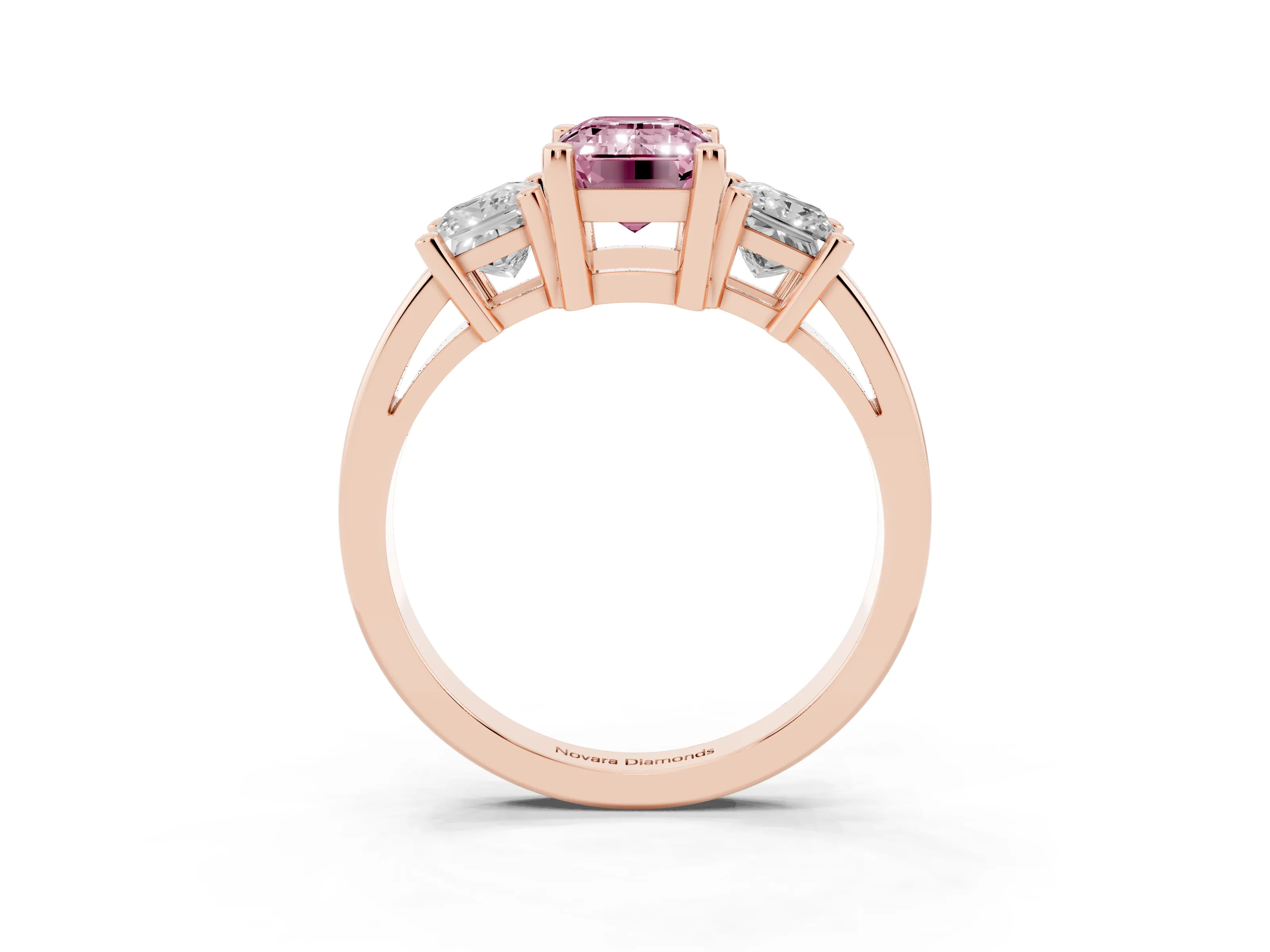Fancy Pink Three-Stone Emerald Cut Diamond Solitaire Ring Set in Rose gold with Prong Setting