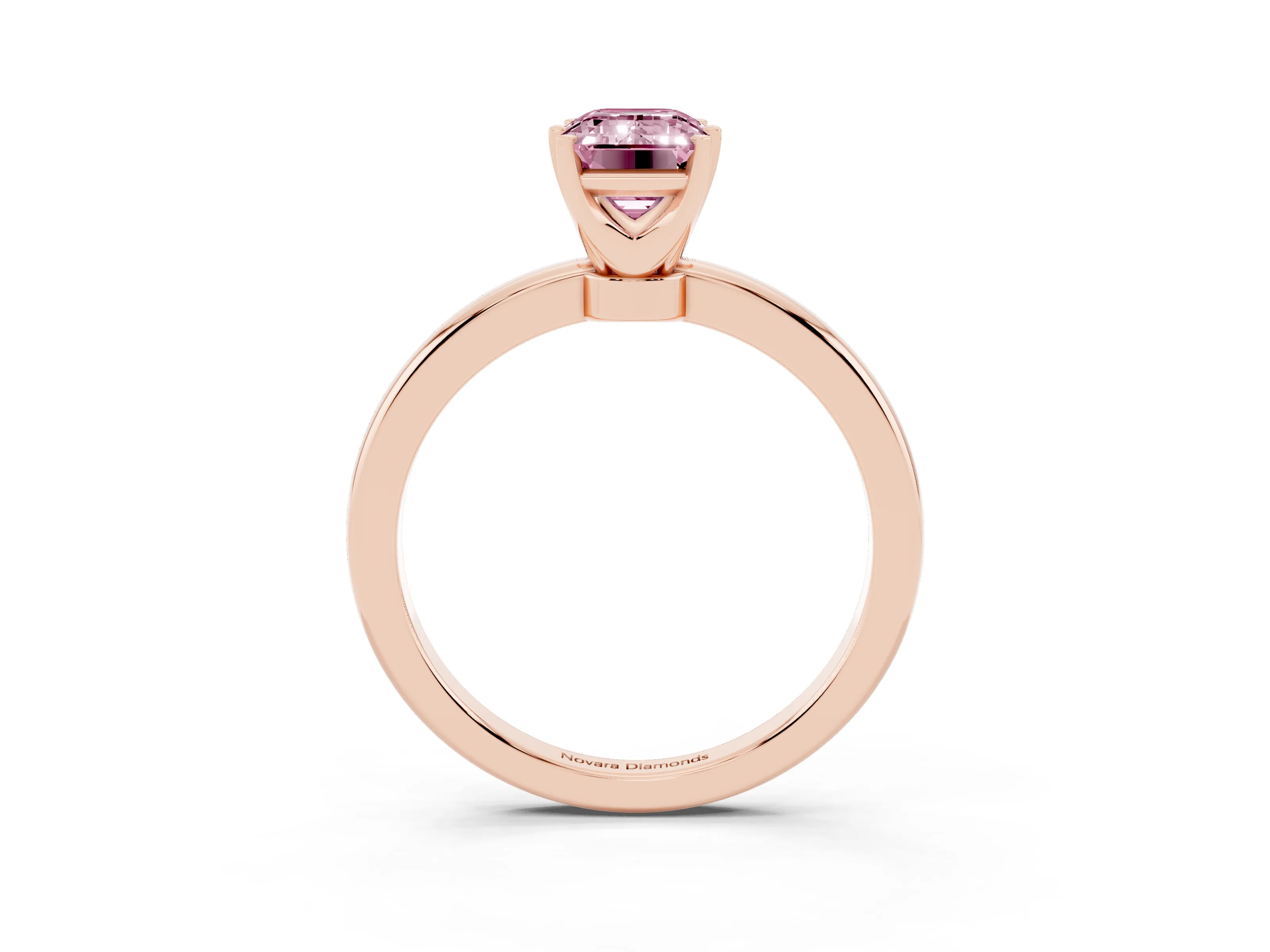 Fancy Pink Emerald Cut Diamond Solitaire Ring Set in Rose gold with Raised Prong Setting on a Classic Band