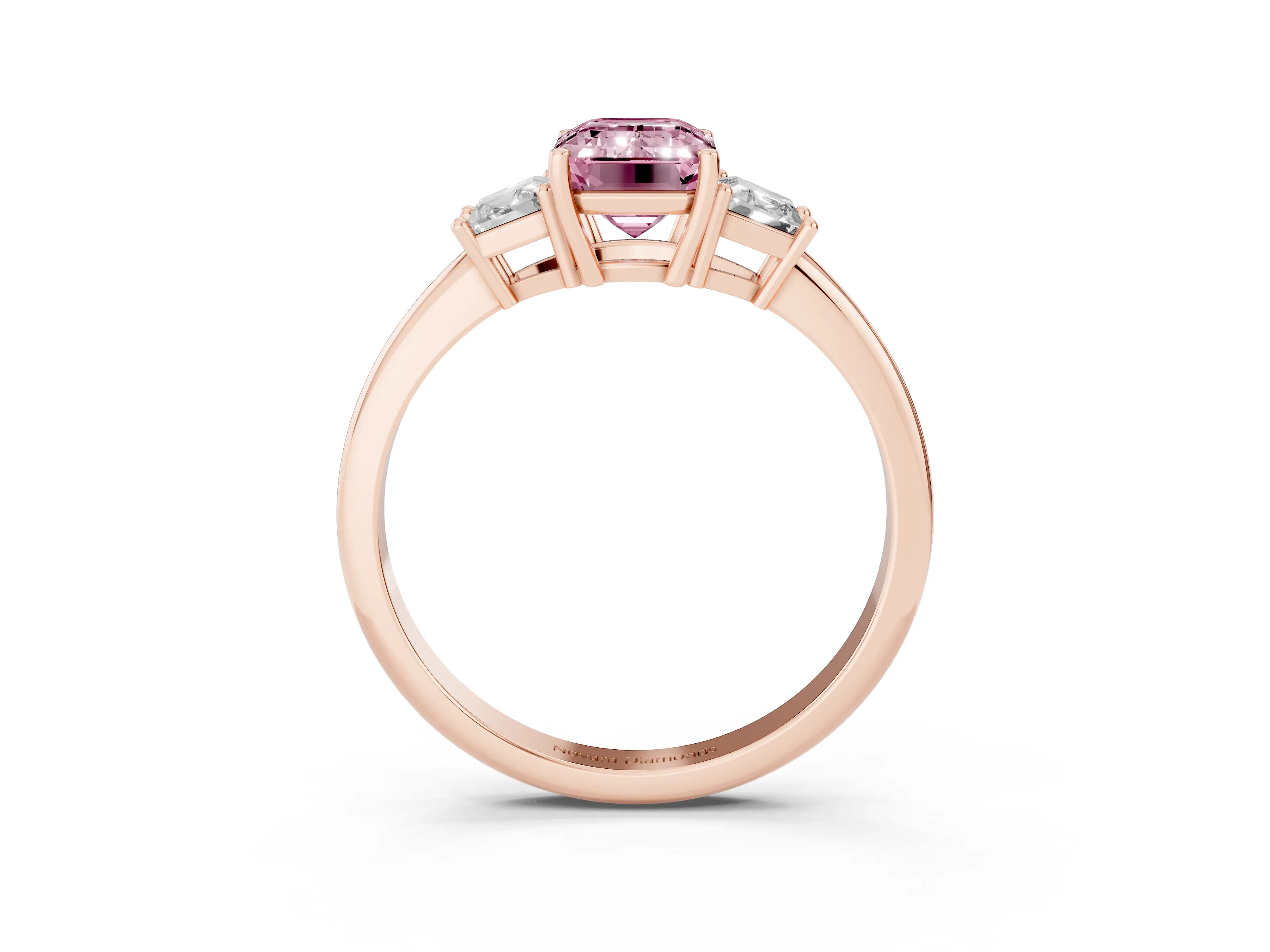 Fancy Pink Emerald Cut Diamond Three-Stone Ring Set in Rose gold with Trapezoid Side Stones and Prong Setting