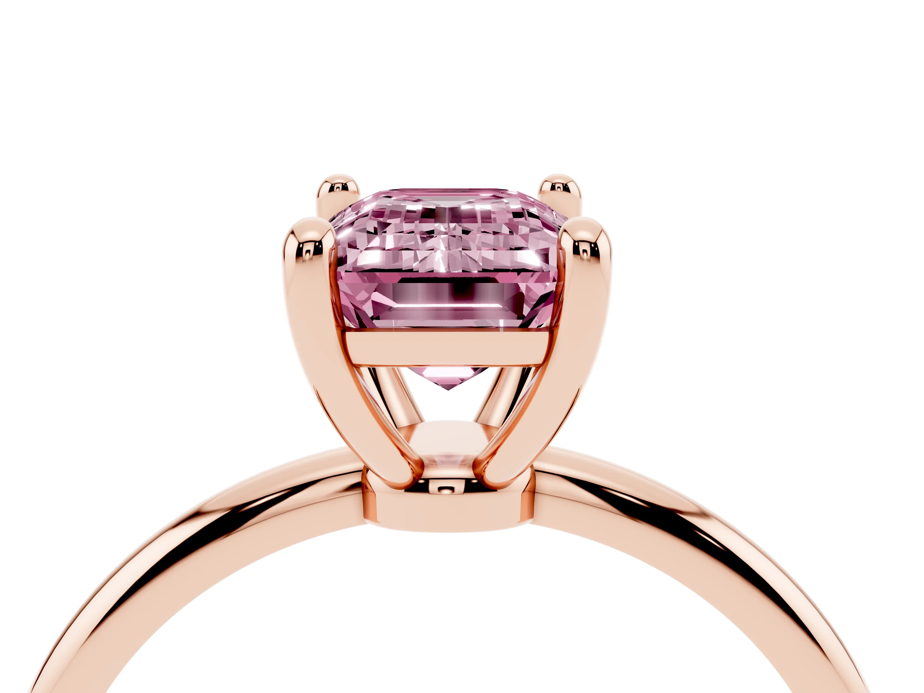 Fancy Pink Emerald Cut Diamond Solitaire Ring Set in Rose gold with Secure Prong Setting on a Classic Band