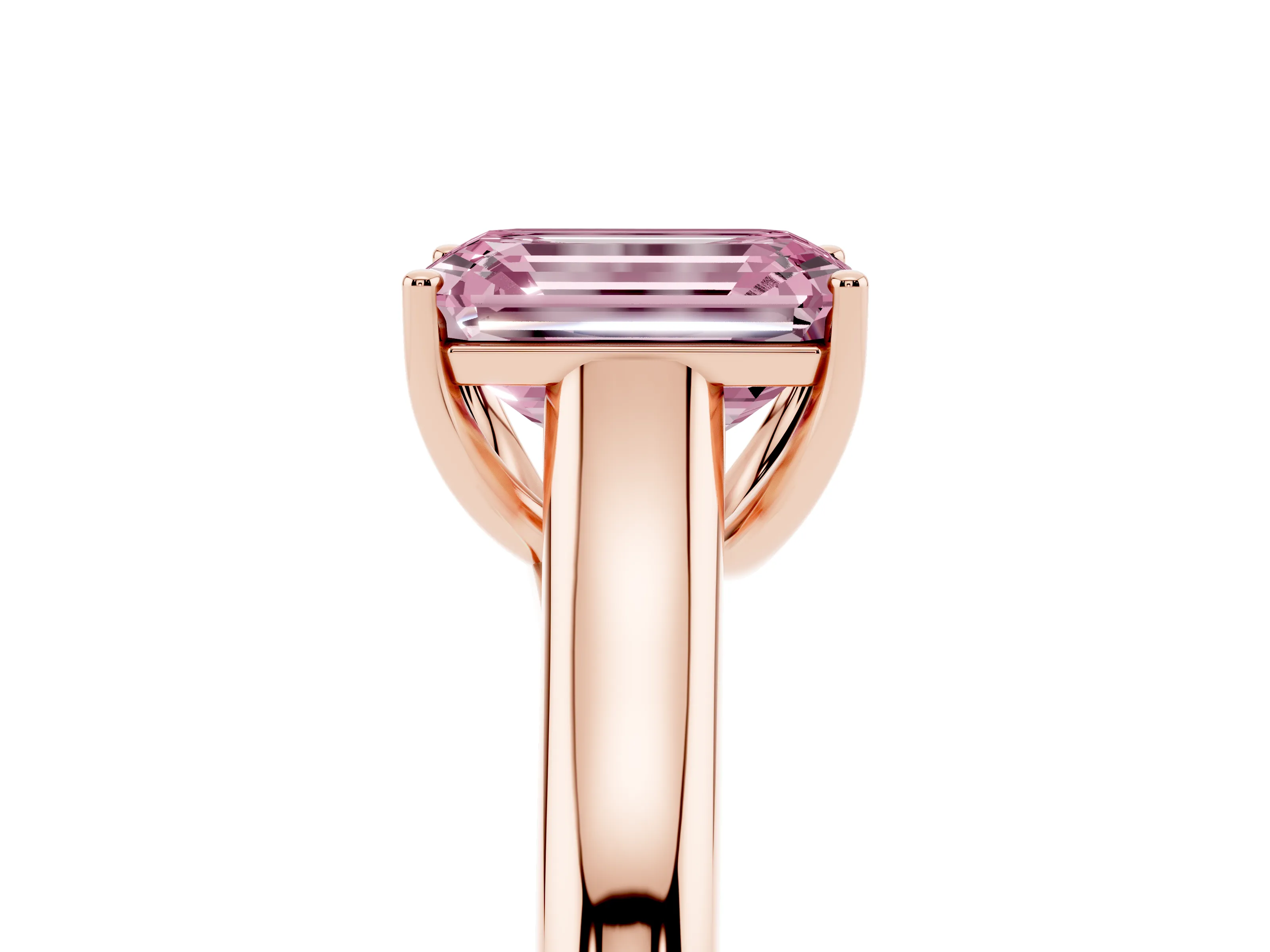 Fancy Pink Emerald Cut Diamond Solitaire Engagement Ring Set in Rose gold with Subtly Tapered Band and Prong Setting