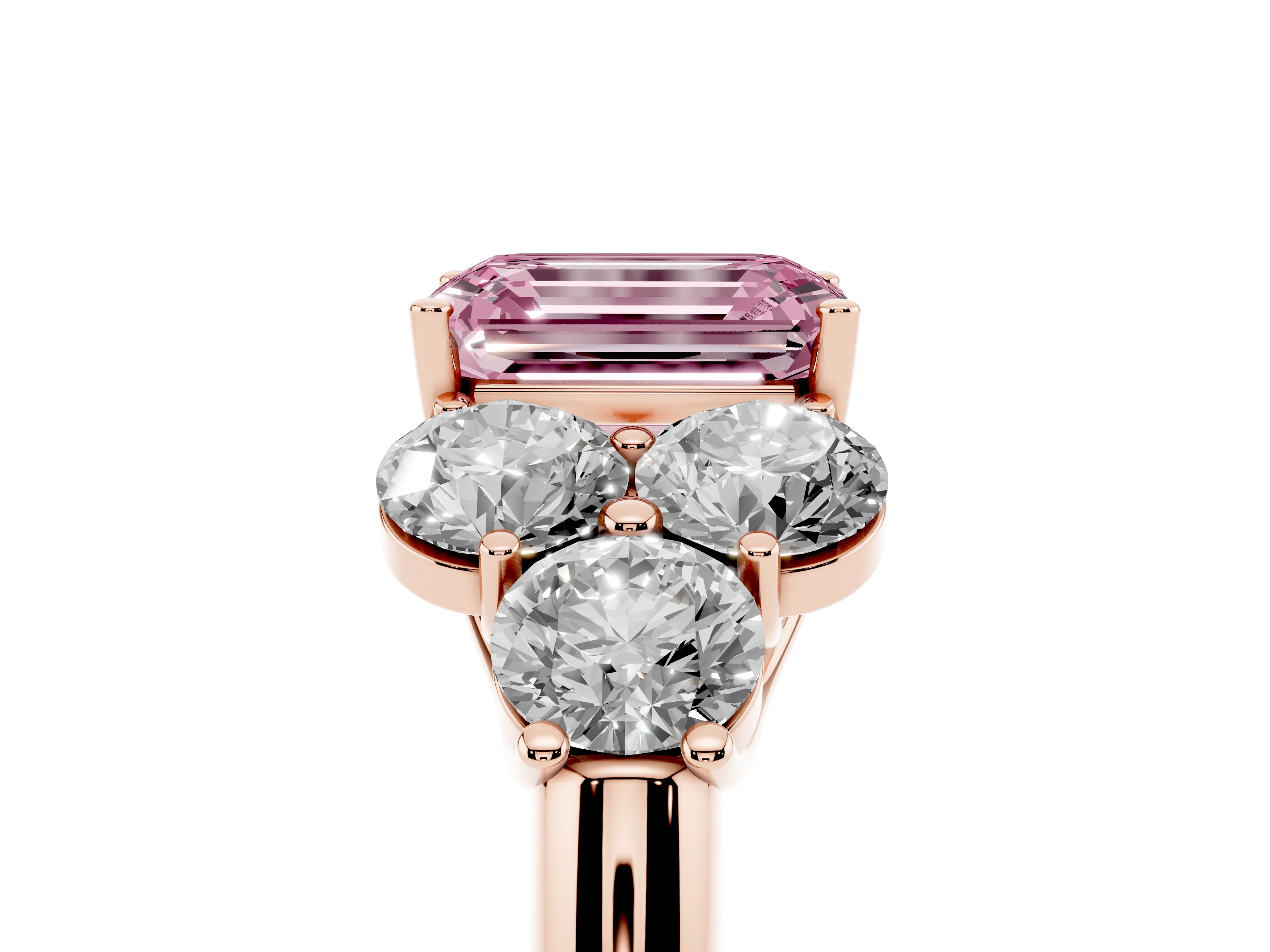 Fancy Pink Emerald Cut Diamond Cluster Ring Set in Rose gold with Round Accent Stones and Prong Setting on a Plain Band