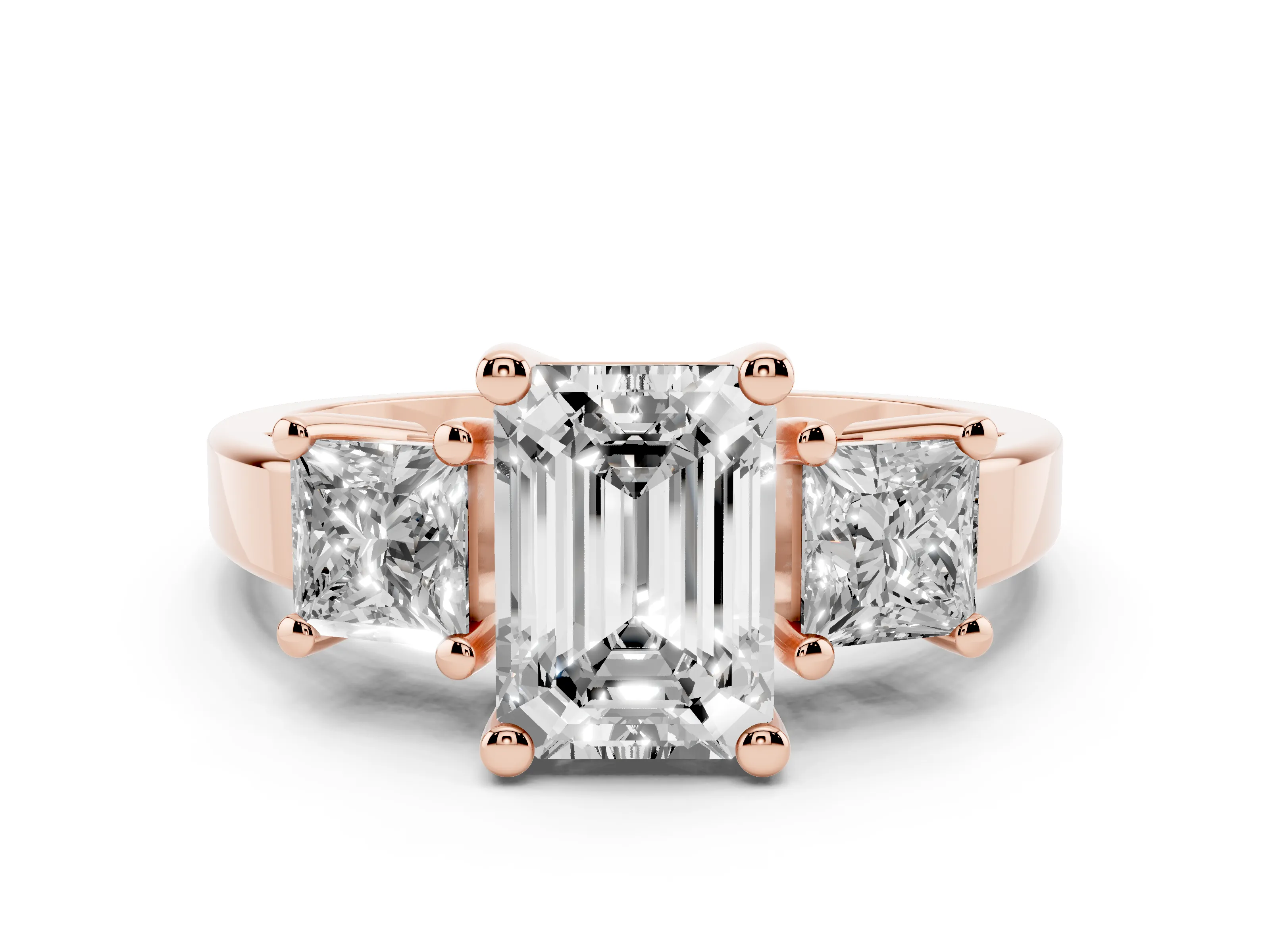 Three-Stone Emerald Cut Diamond Solitaire Ring Set in Rose gold with Prong Setting