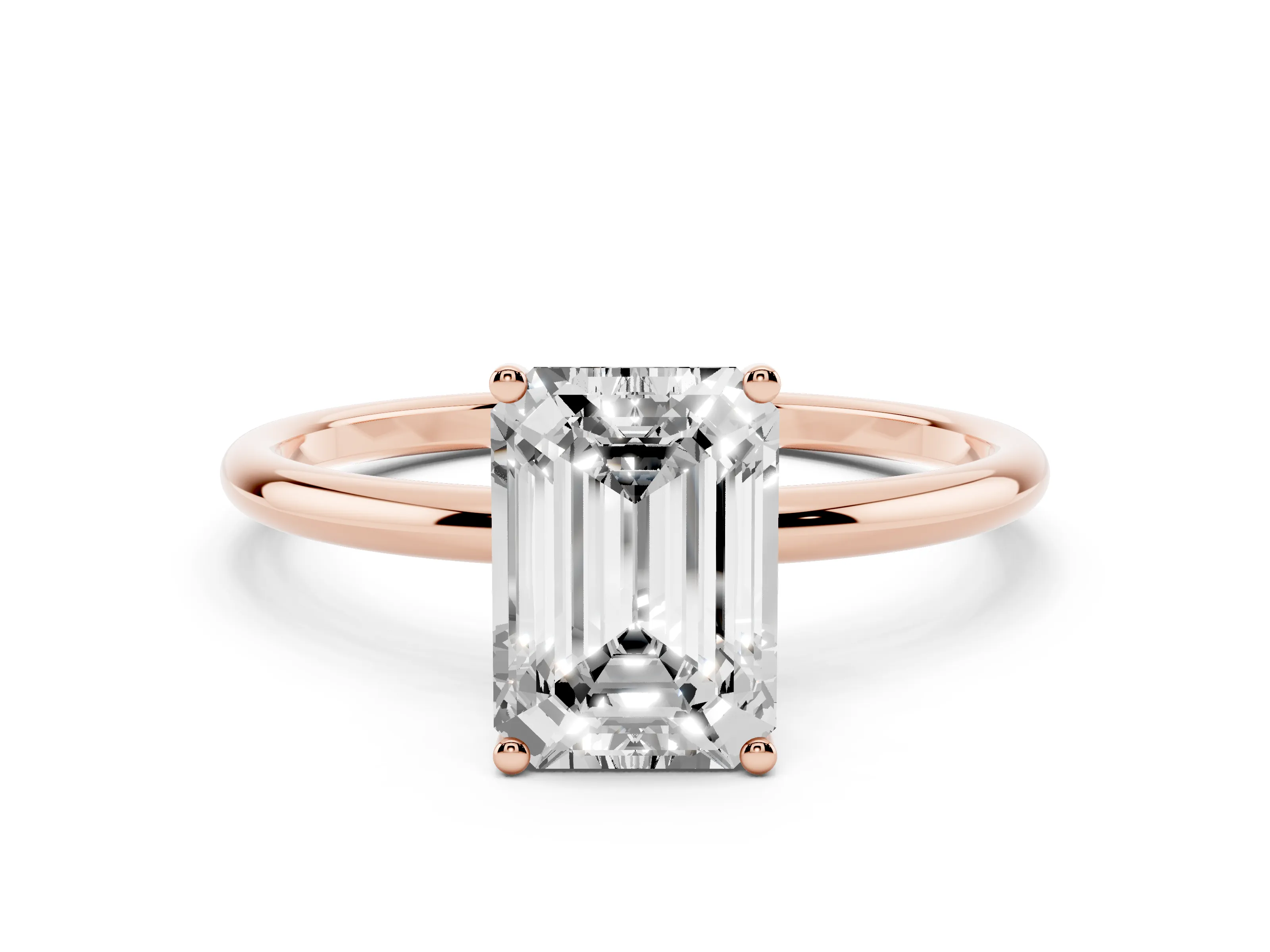 Emerald Cut Diamond Solitaire Engagement Ring Set in Rose gold with Thin Band and Prong Setting