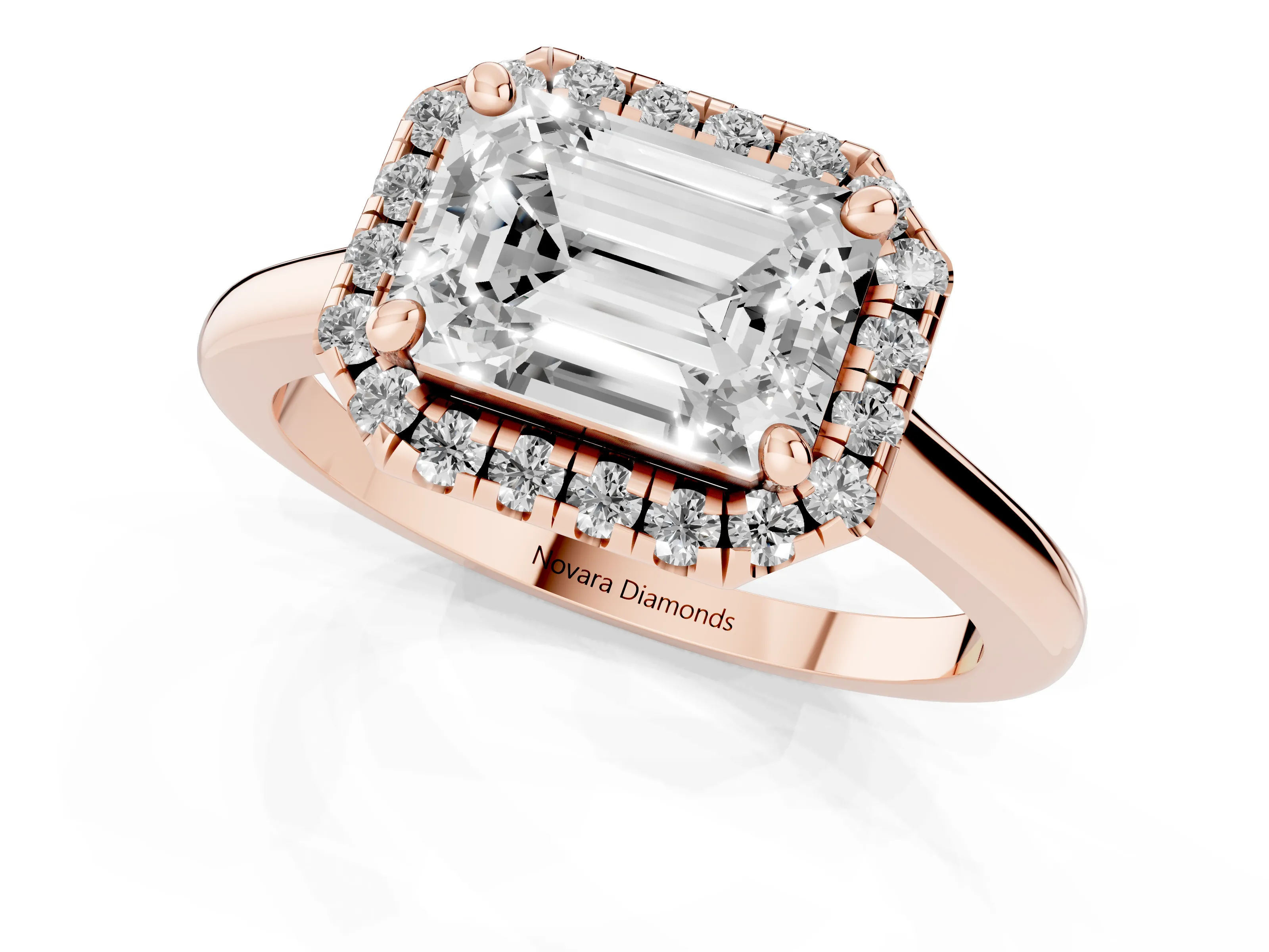 Emerald Cut Diamond Halo Engagement Ring Set in Rose gold with Pavé Band and Rising Shoulders