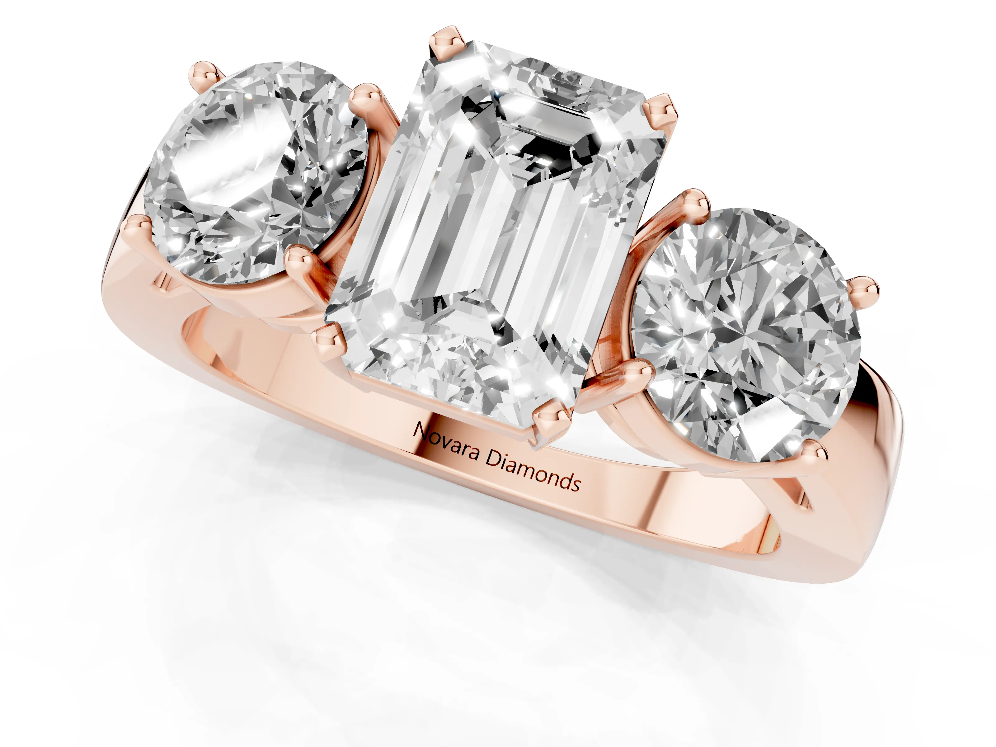 Emerald Cut Diamond Three-Stone Ring Set in Rose gold with Round Side Stones and Classic Band