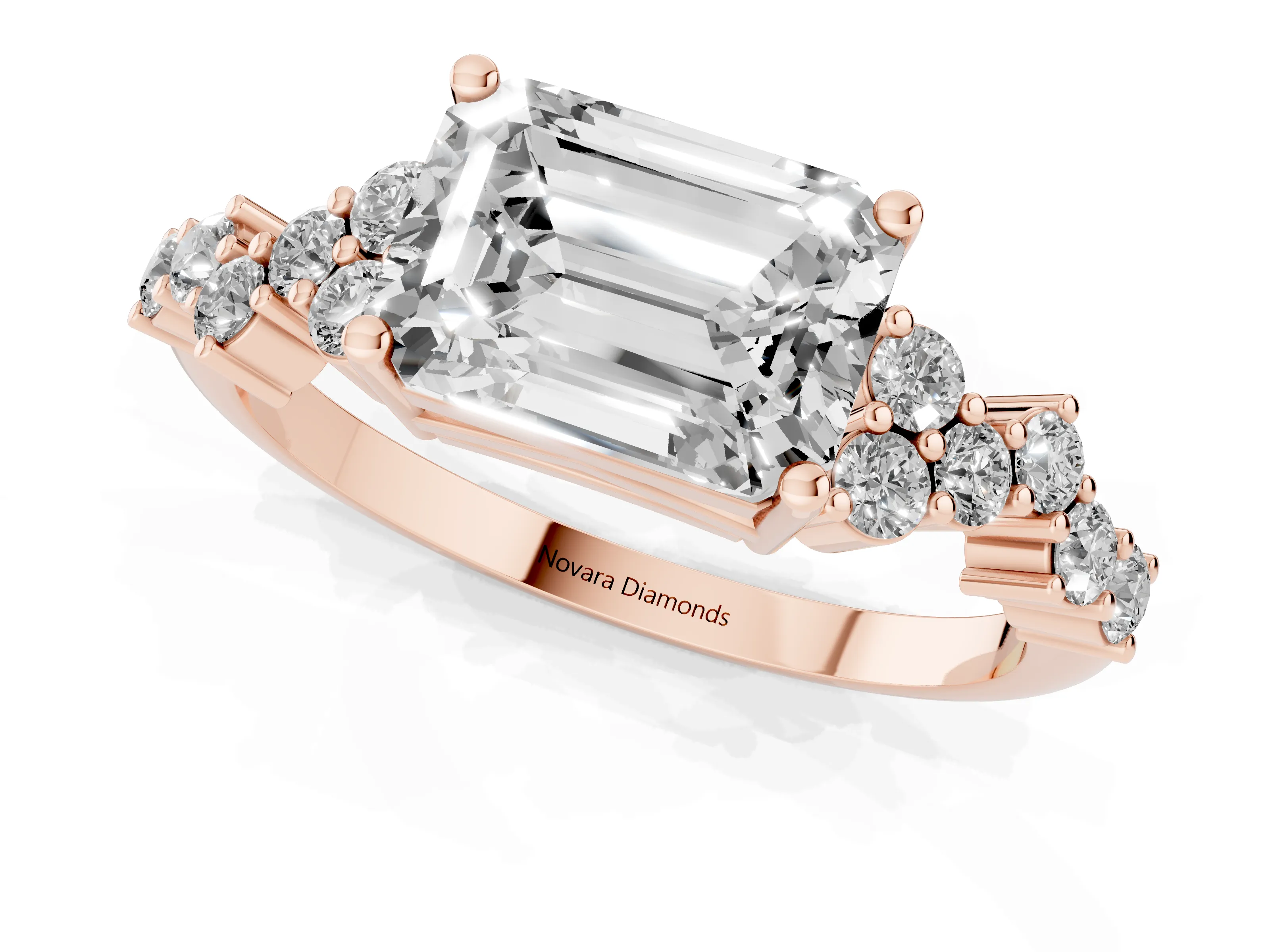 Emerald Cut Diamond Ring Set in Rose gold with Scattered Round Accents