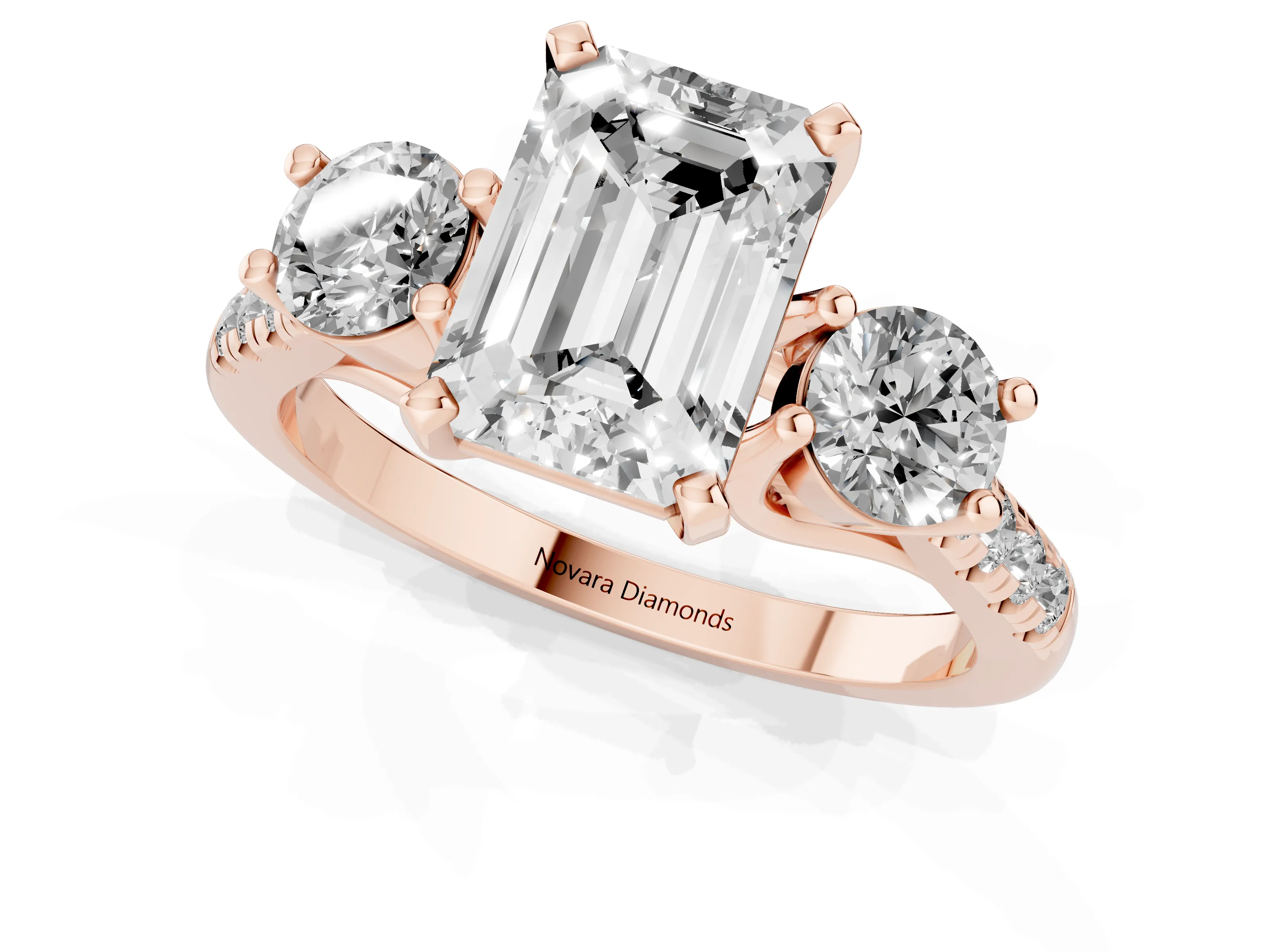 Three-Stone Emerald Cut Diamond Pavé Band Ring Set in Rose gold with Prong-Set Trio