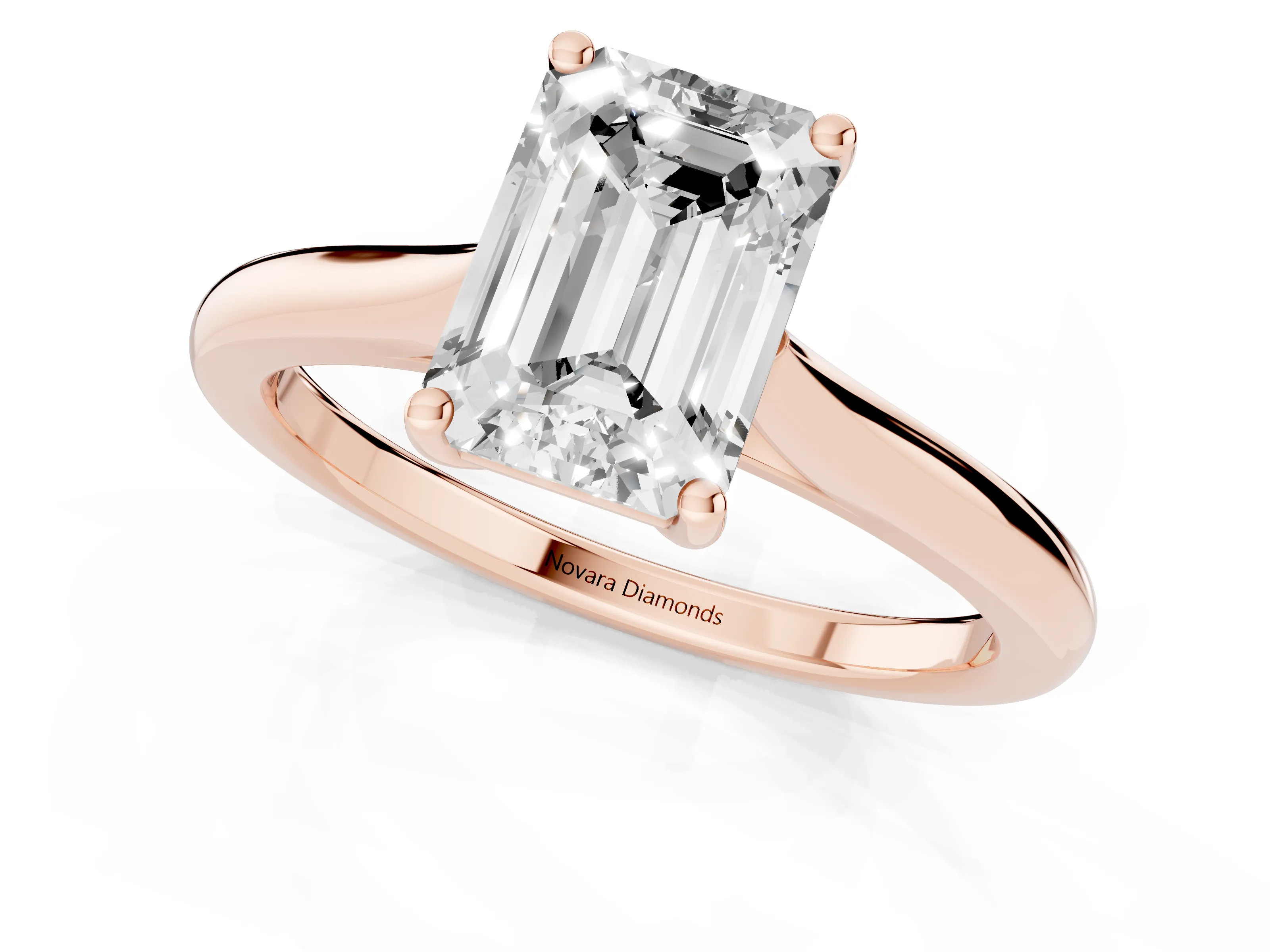 Emerald Cut Diamond Solitaire Ring Set in Rose gold with Cathedral Band and Prong Setting
