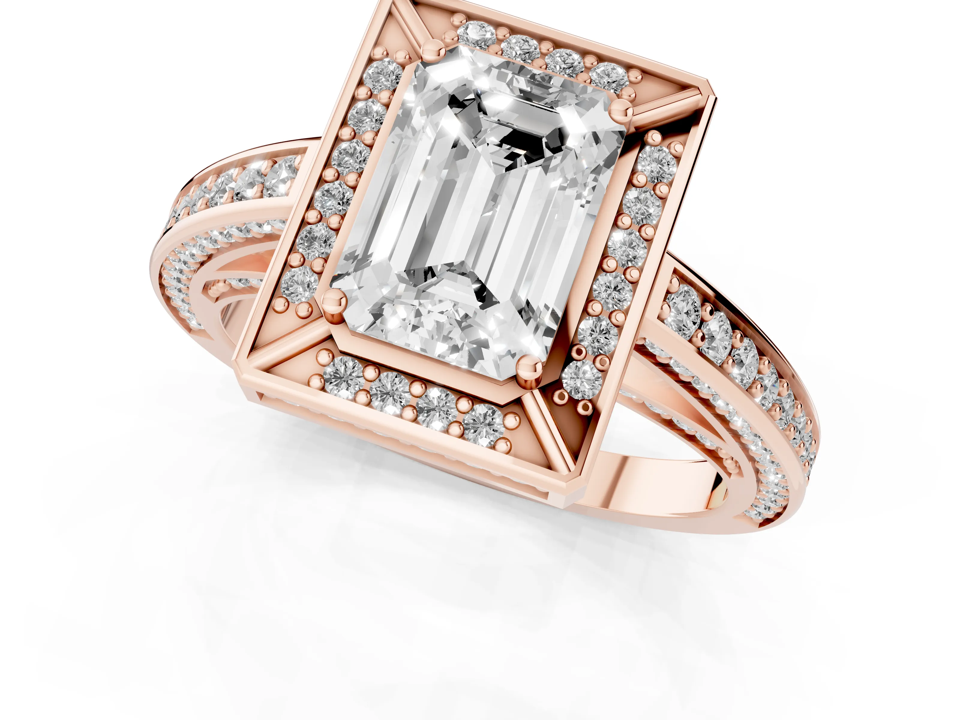 Emerald Cut Diamond Halo Pavé Split Shank Ring Set in Rose gold with Prong Setting