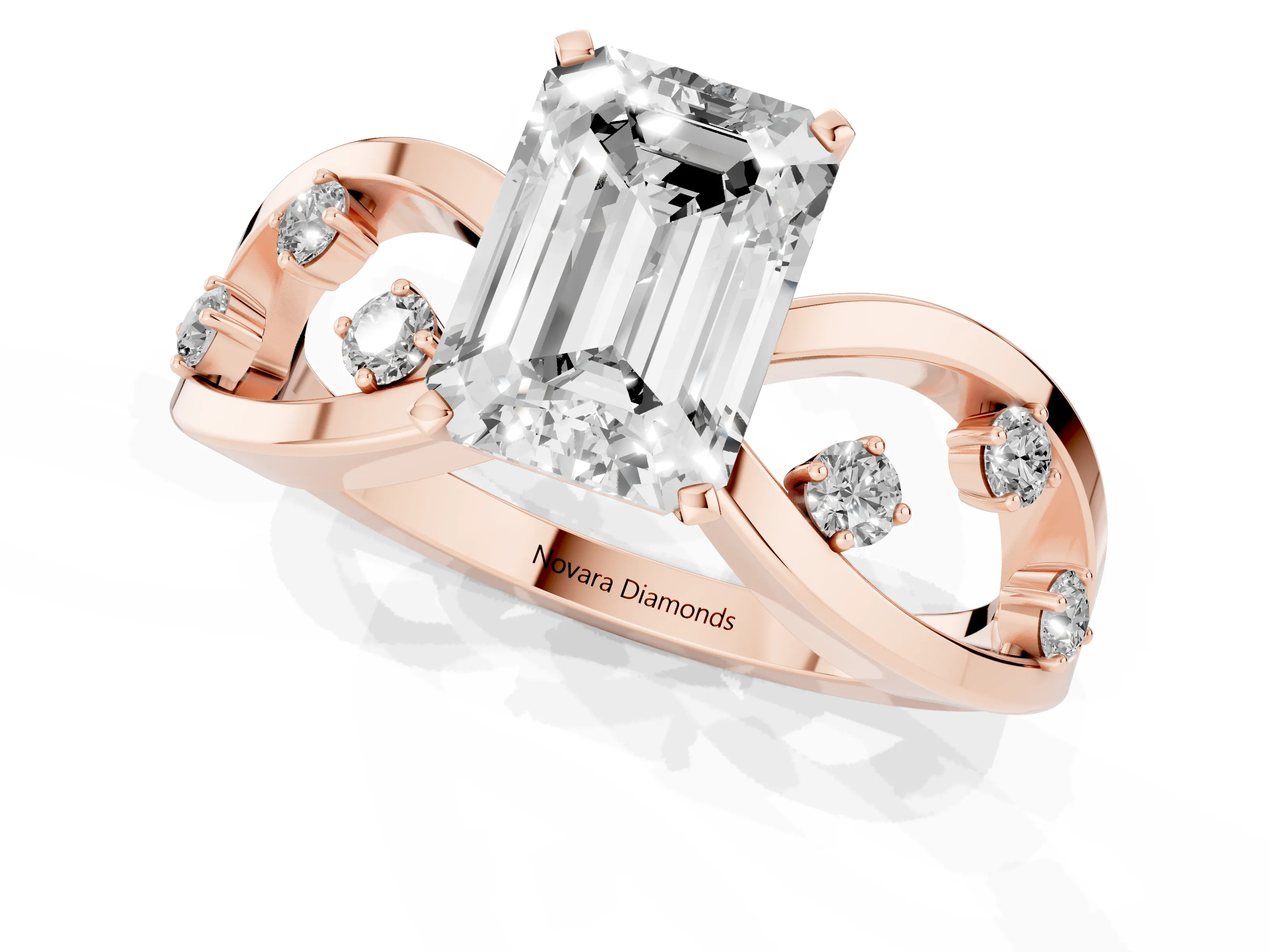 Emerald Cut Diamond Solitaire Ring Set in Rose gold with Side Stones on Criss-Cross Band and Prong Setting