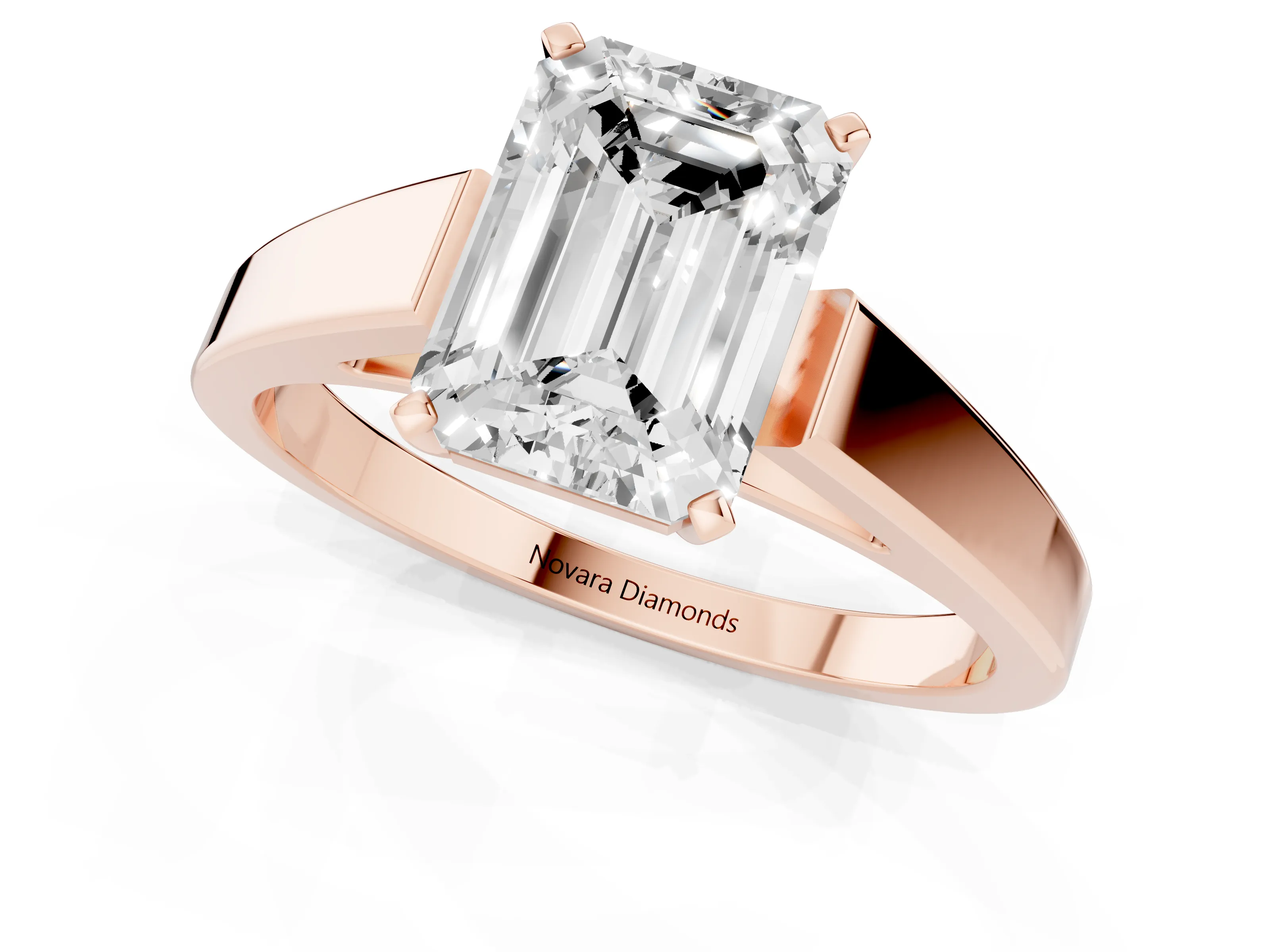 Emerald Cut Diamond Solitaire Engagement Ring Set in Rose gold with Prong Setting and Tapered Band