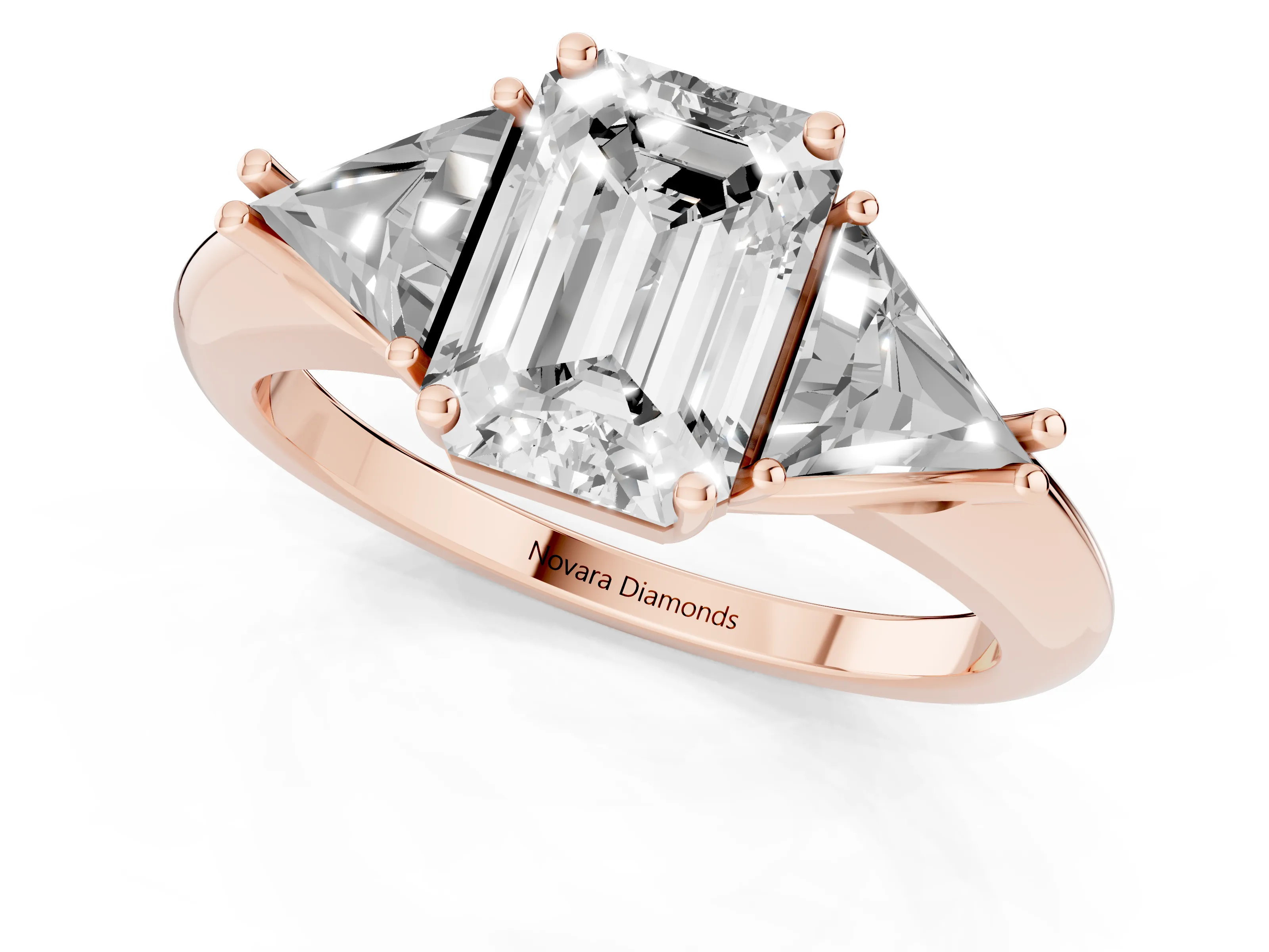 Emerald Cut Diamond Three-Stone Engagement Ring Set in Rose gold with Trillion Side Stones