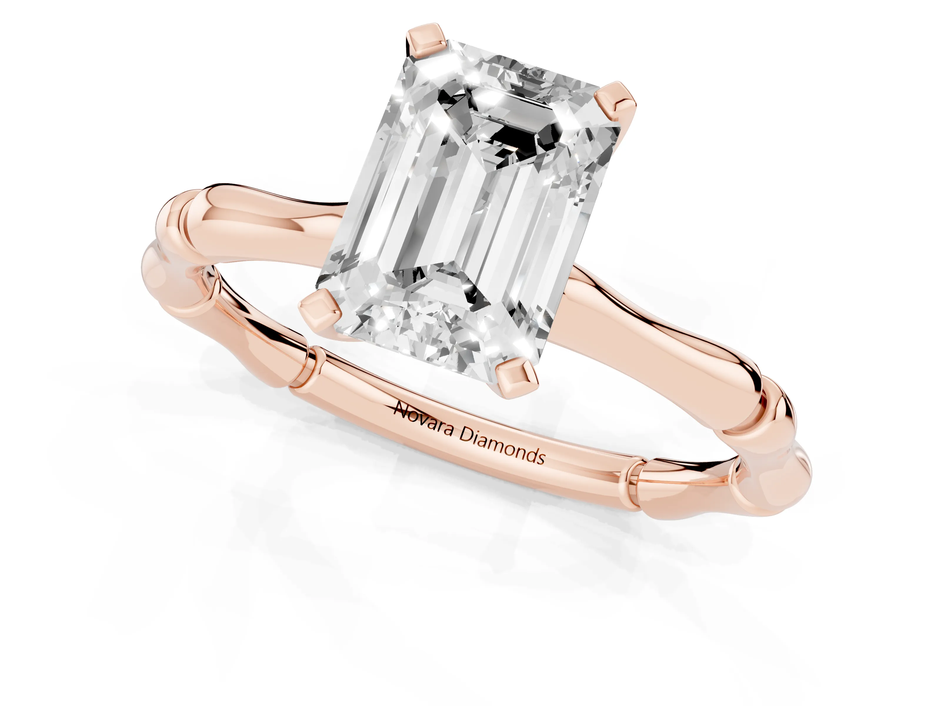 Emerald Cut Diamond Solitaire Ring Set in Rose gold with Bamboo Band and Prong Setting