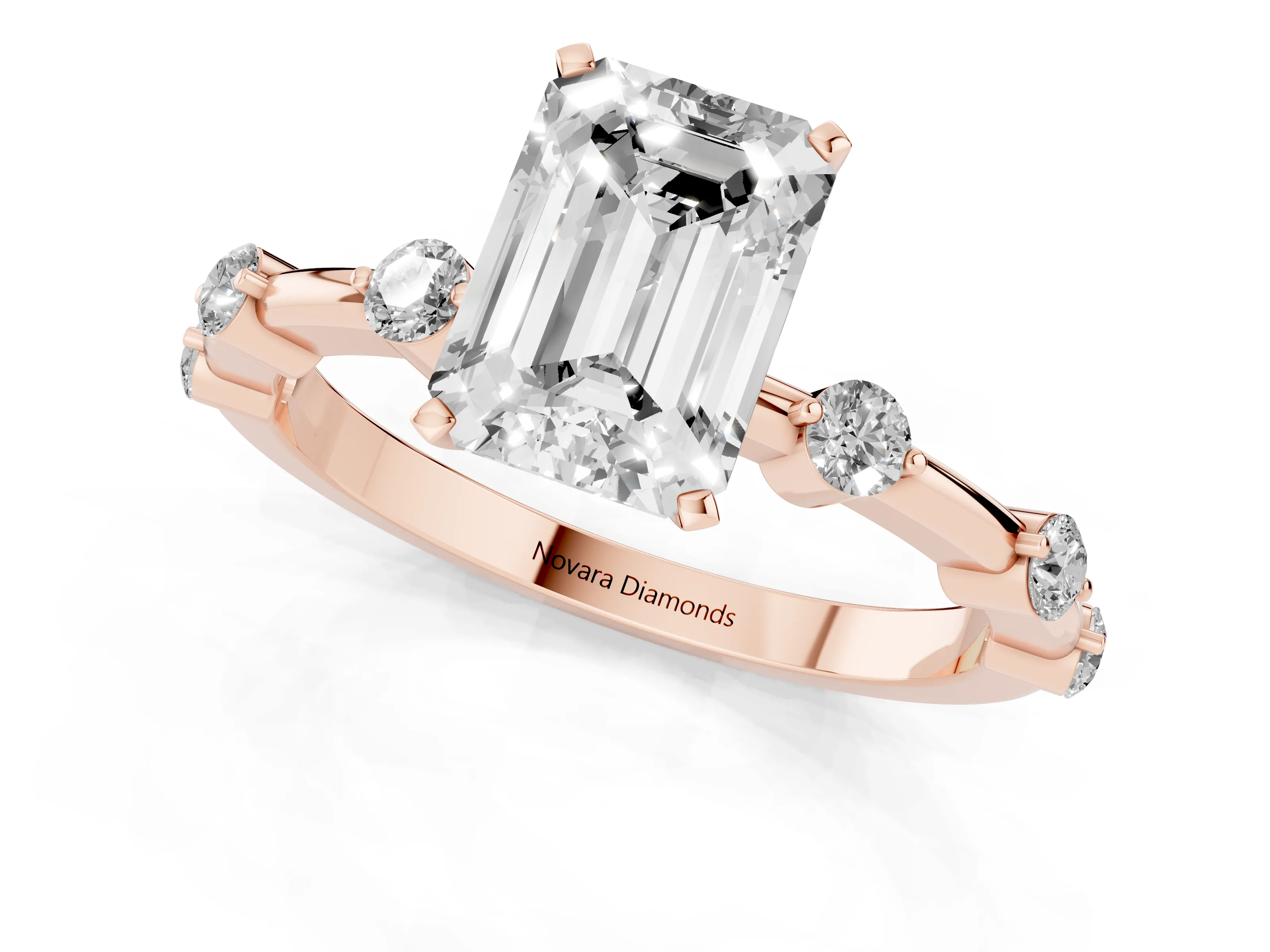 Emerald Cut Diamond Solitaire Ring Set in Rose gold with Bezel Set Side Stones and Prong Setting