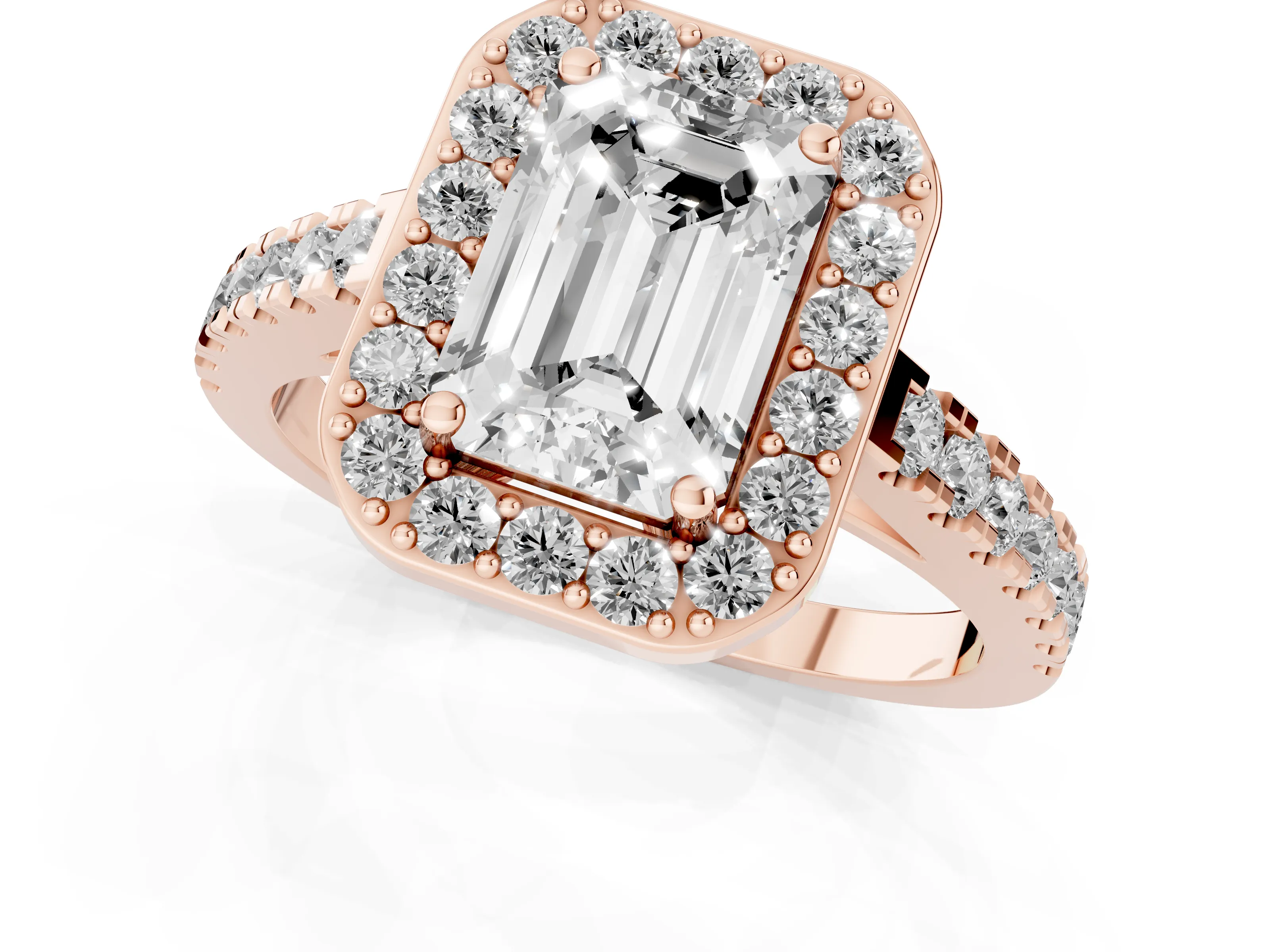 Emerald Cut Diamond Halo Ring Set in Rose gold with Round Pavé Split Shank and Prong Setting
