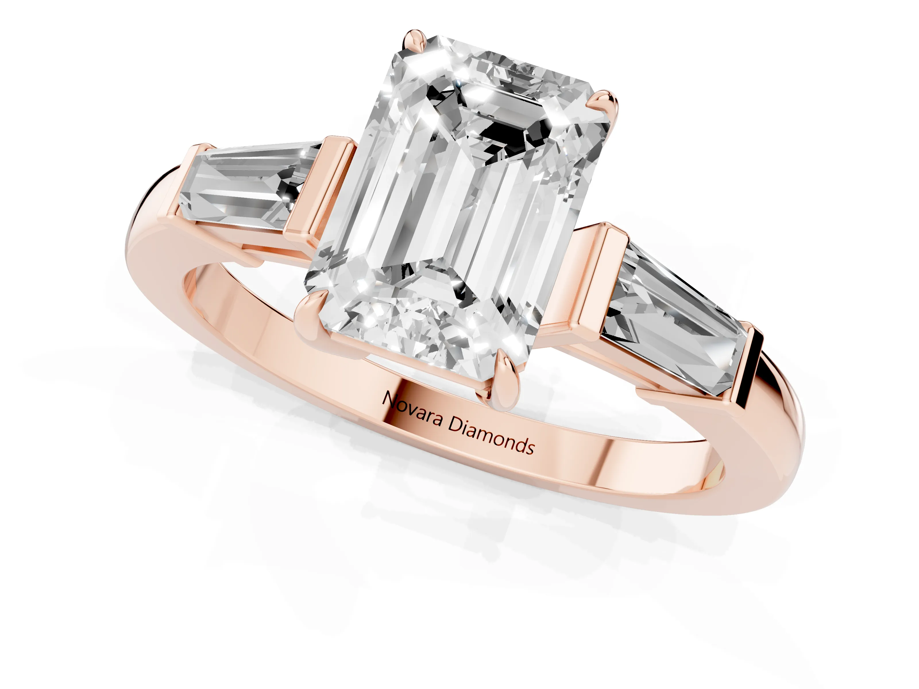 Emerald Cut Diamond Three-Stone Ring Set in Rose gold with Tapered Baguette Side Stones and Prong Setting