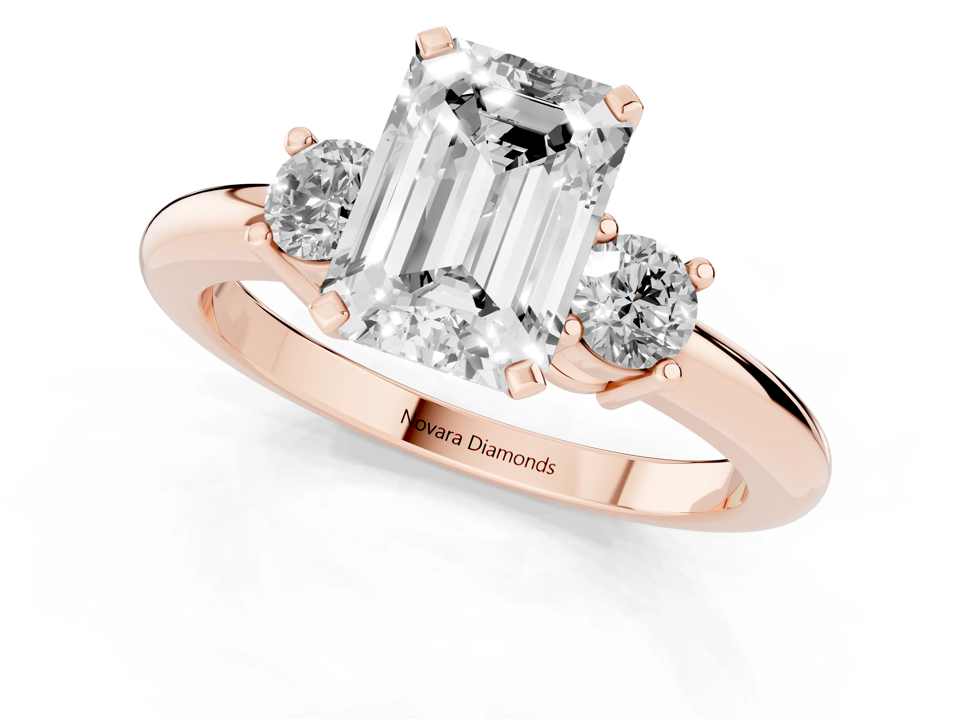 Three-Stone Emerald Cut Diamond Ring Set in Rose gold with Prong Setting and Plain Band