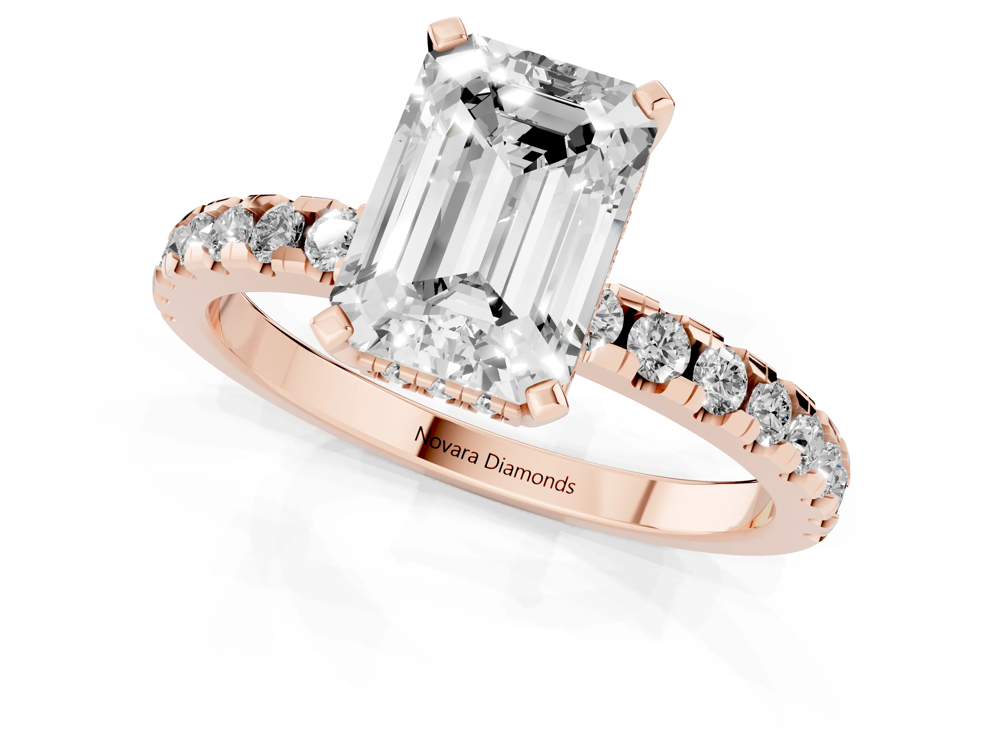 Emerald Cut Diamond Pavé Solitaire Ring Set in Rose gold with Round Band Accents and Prong Setting
