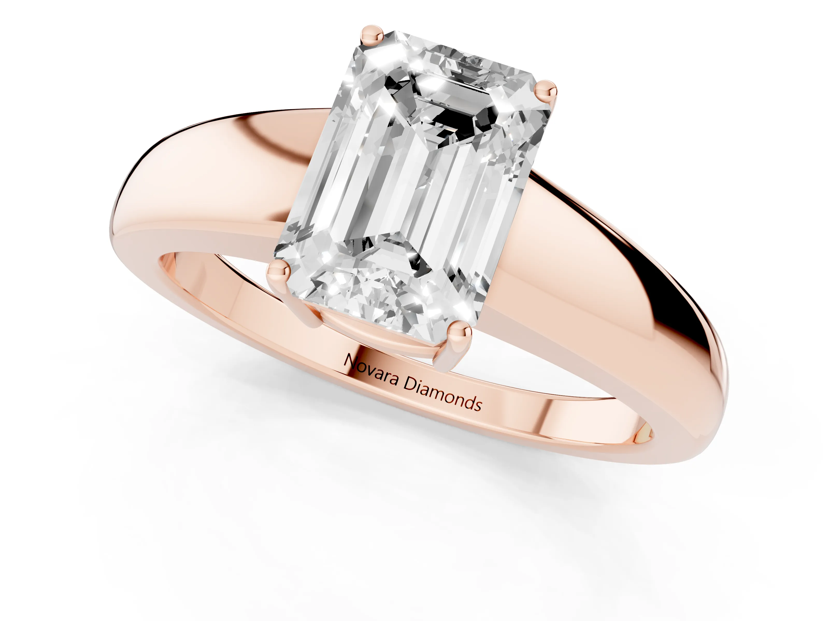 Emerald Cut Diamond Solitaire Ring Set in Rose gold with Tapered Band and Prong Setting