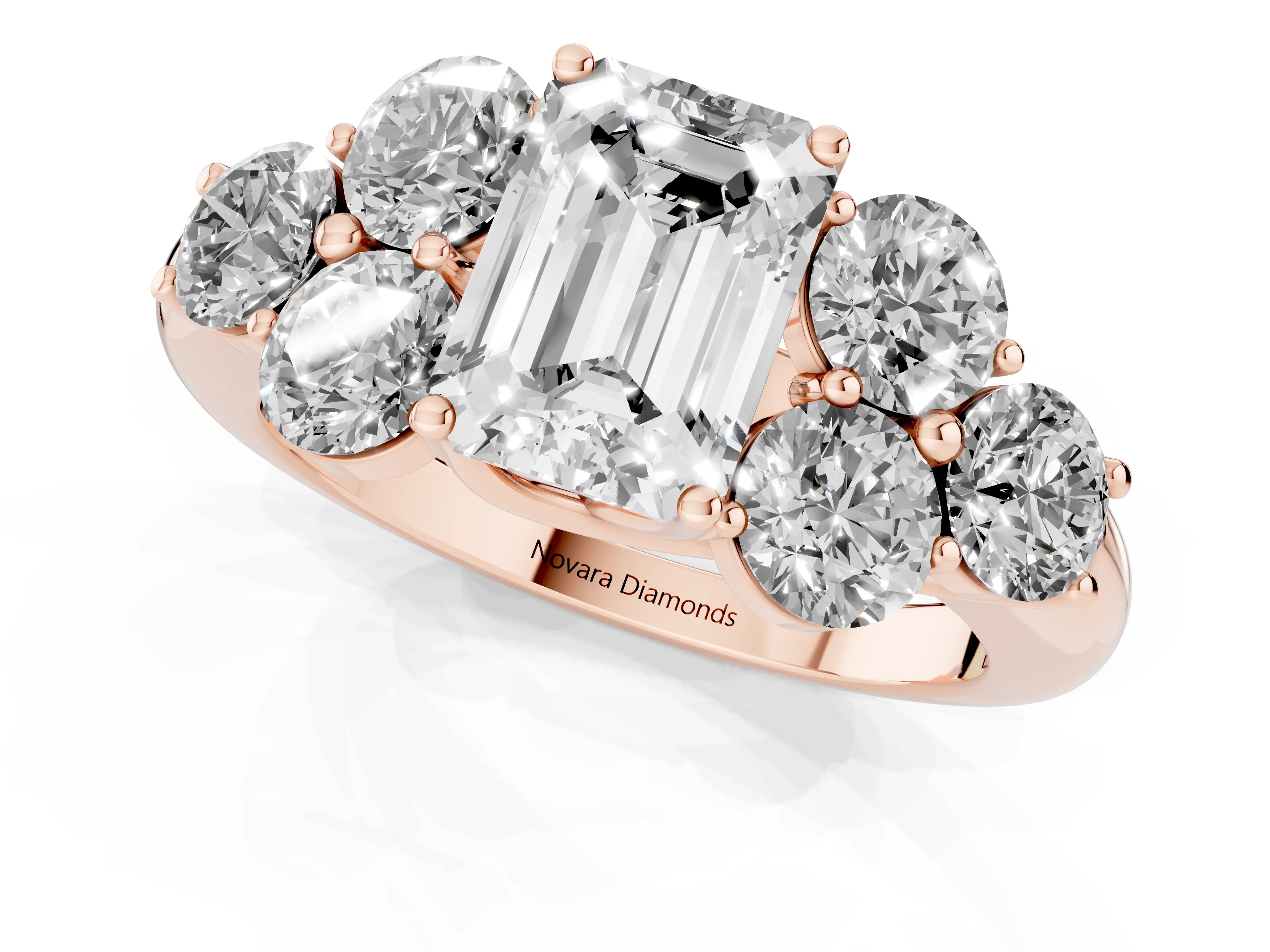 Emerald Cut Diamond Cluster Ring Set in Rose gold with Round Accent Stones and Prong Setting on a Plain Band