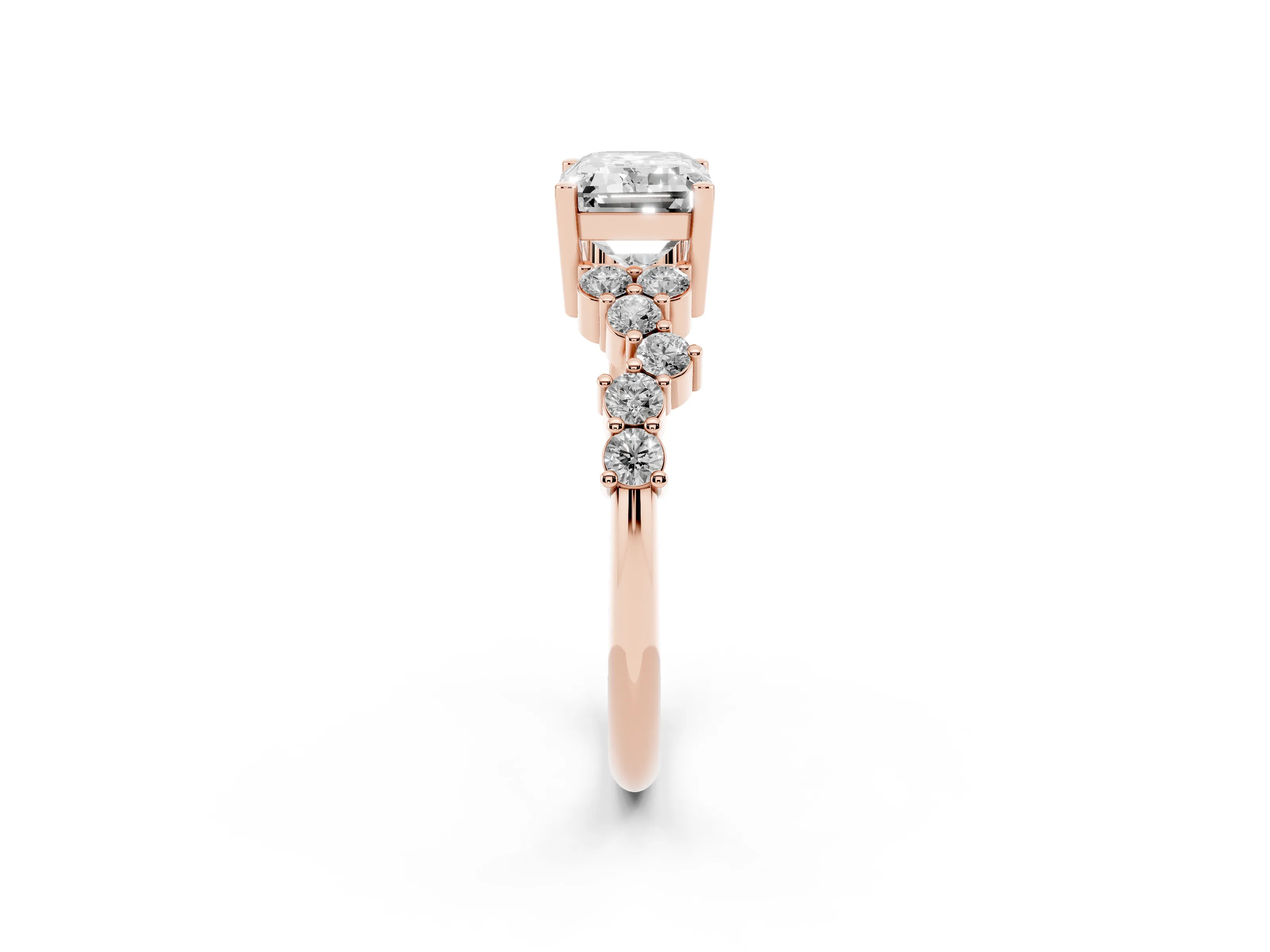 Emerald Cut Diamond Ring Set in Rose gold with Scattered Round Accents