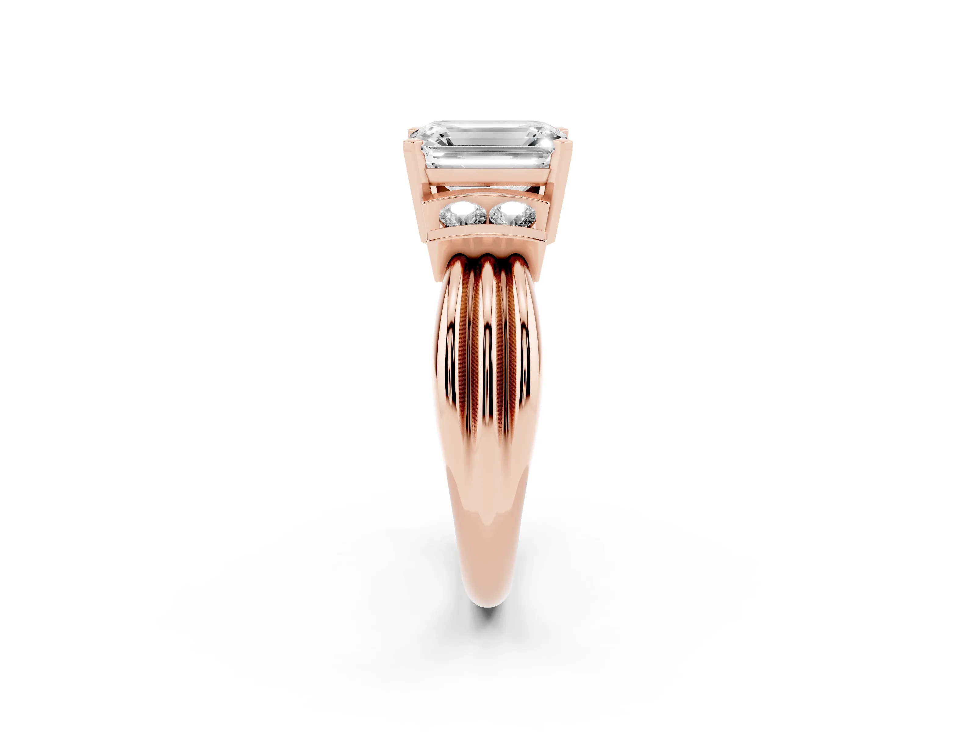 Three-Stone Emerald Cut Diamond Channel Set Ring Set in Rose gold with Bar Prongs
