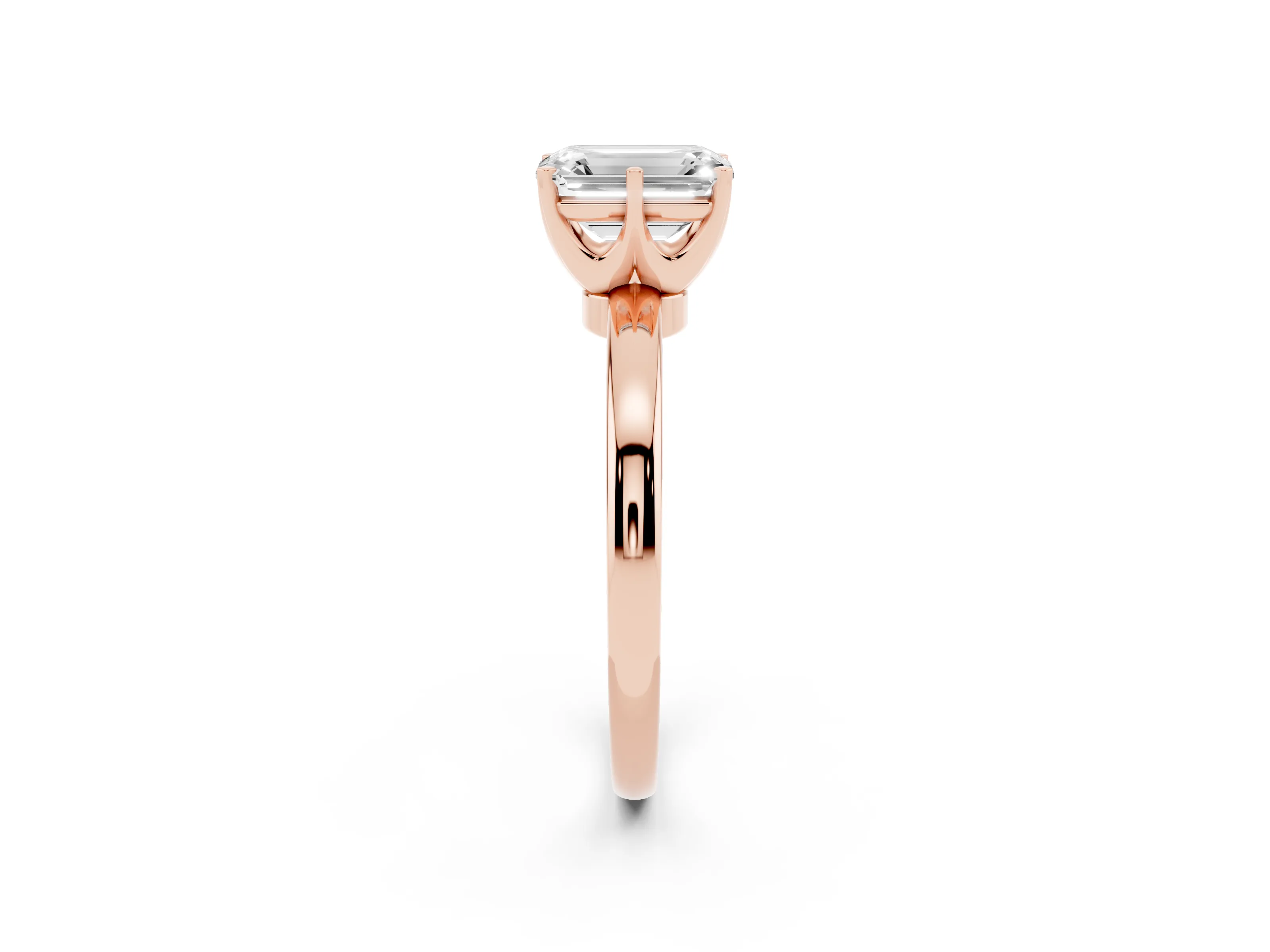Emerald Cut Diamond Solitaire Ring Set in Rose gold with Raised Prong Setting on a Classic Band