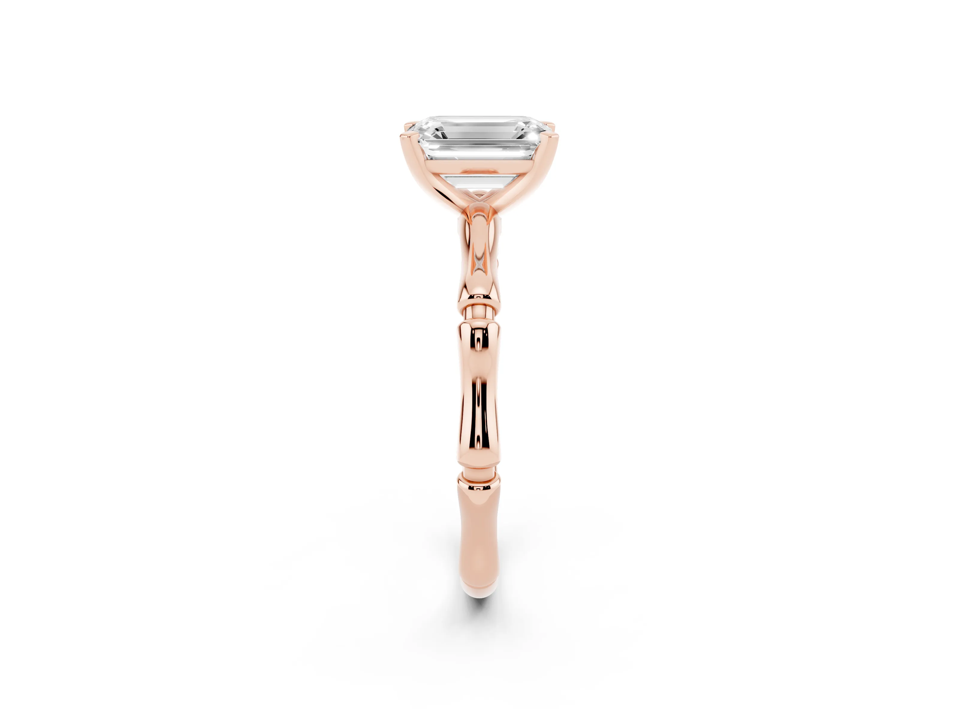 Emerald Cut Diamond Solitaire Ring Set in Rose gold with Bamboo Band and Prong Setting